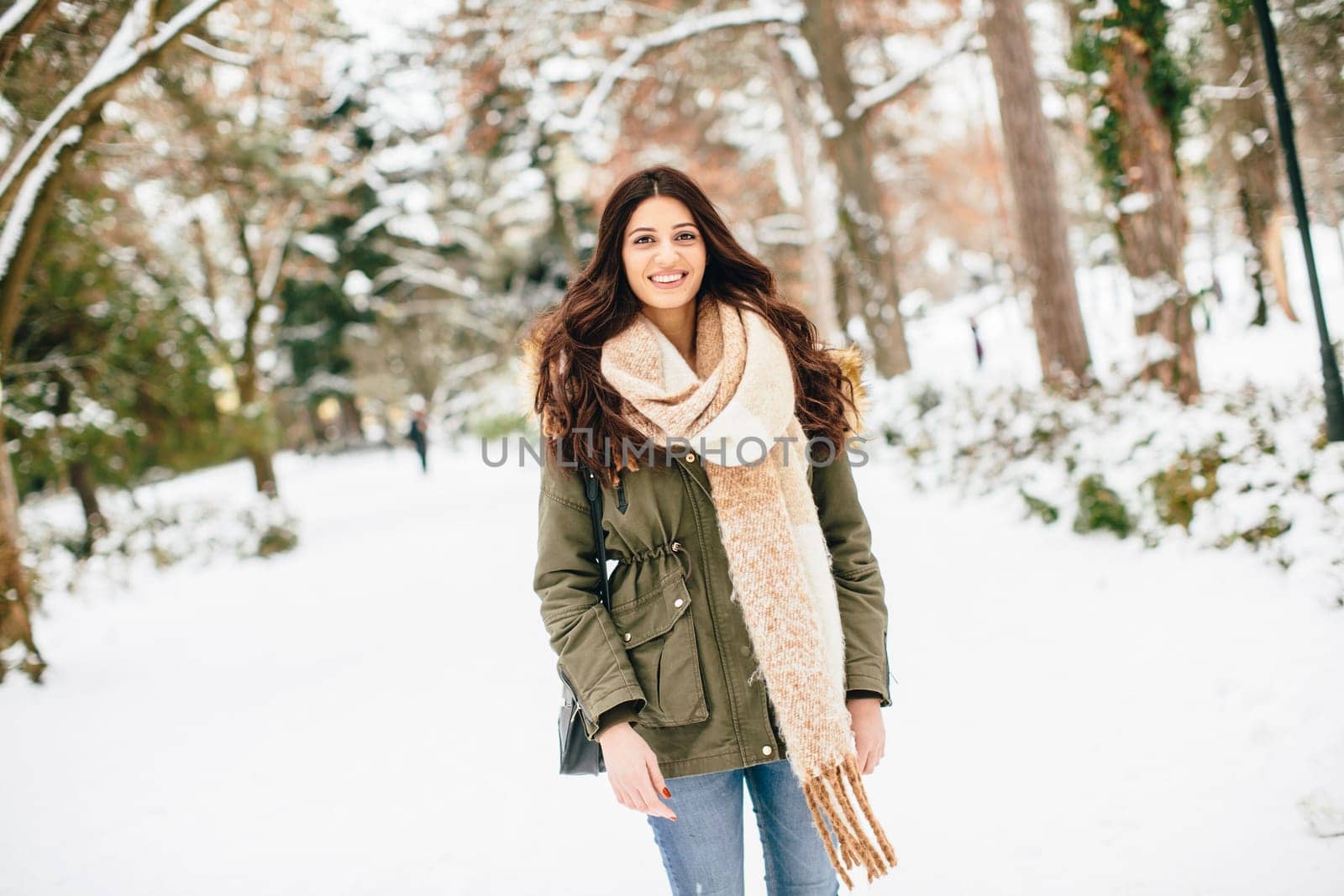 Young woman at cold winter outdoors