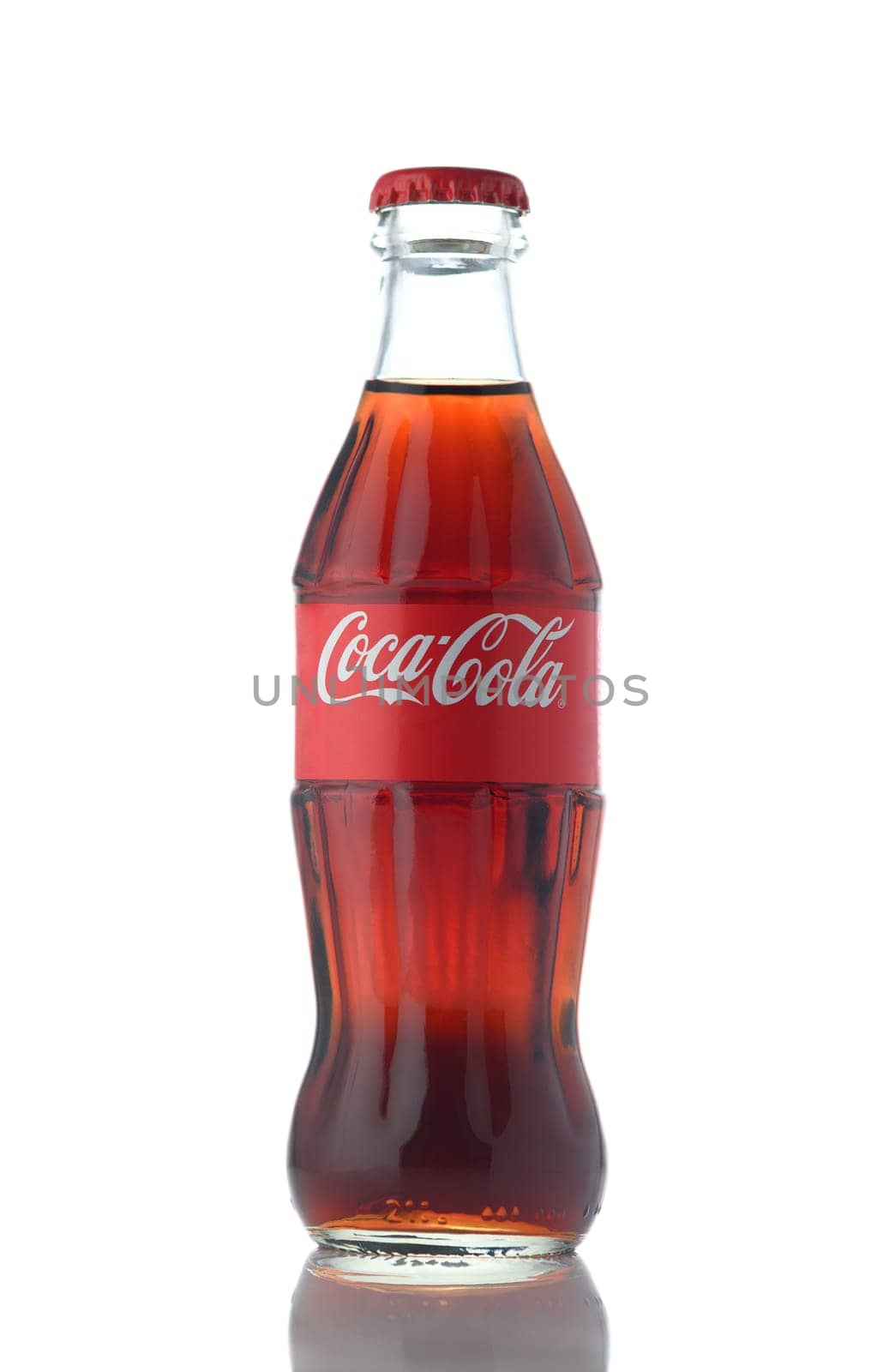 Gaziveren Cyprus -08.03.2025 Glass container showcasing a rich brown beverage, reflecting light, creates a refreshing vibe for any occasion.