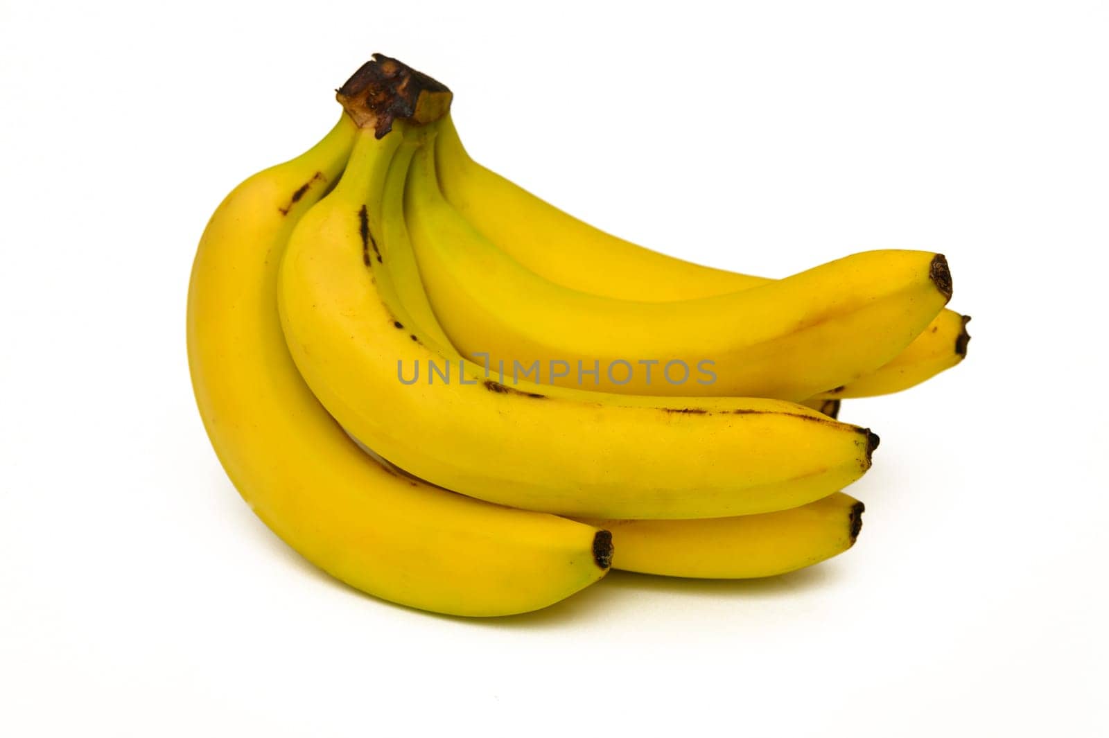 Bright yellow bananas rest together, showcasing their appealing color and ripe texture for health enthusiasts.