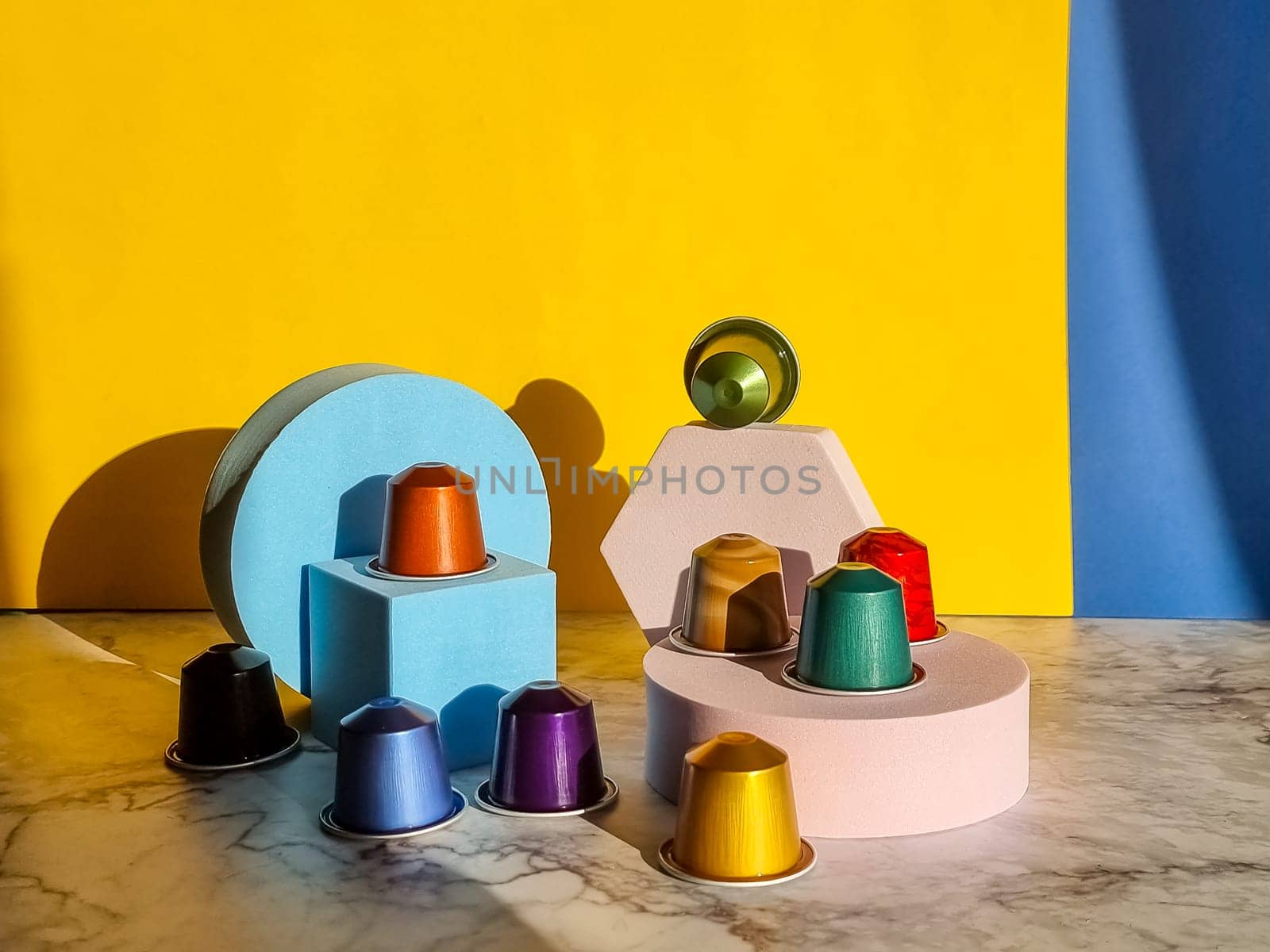 Set of coffee capsules isolated on beige background Top view Flat lay Drink obtained from dosed capsule