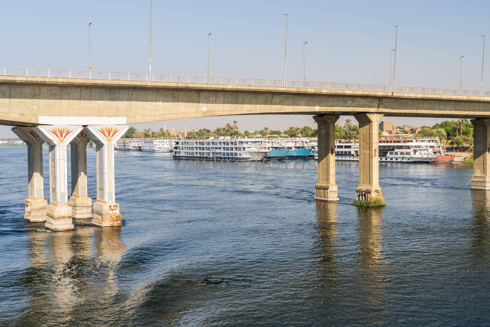 Luxor, Egypt - 2 November 2024:Modern bridge connecting east and west banks of the Nile to access Valley of the Kings from Luxor