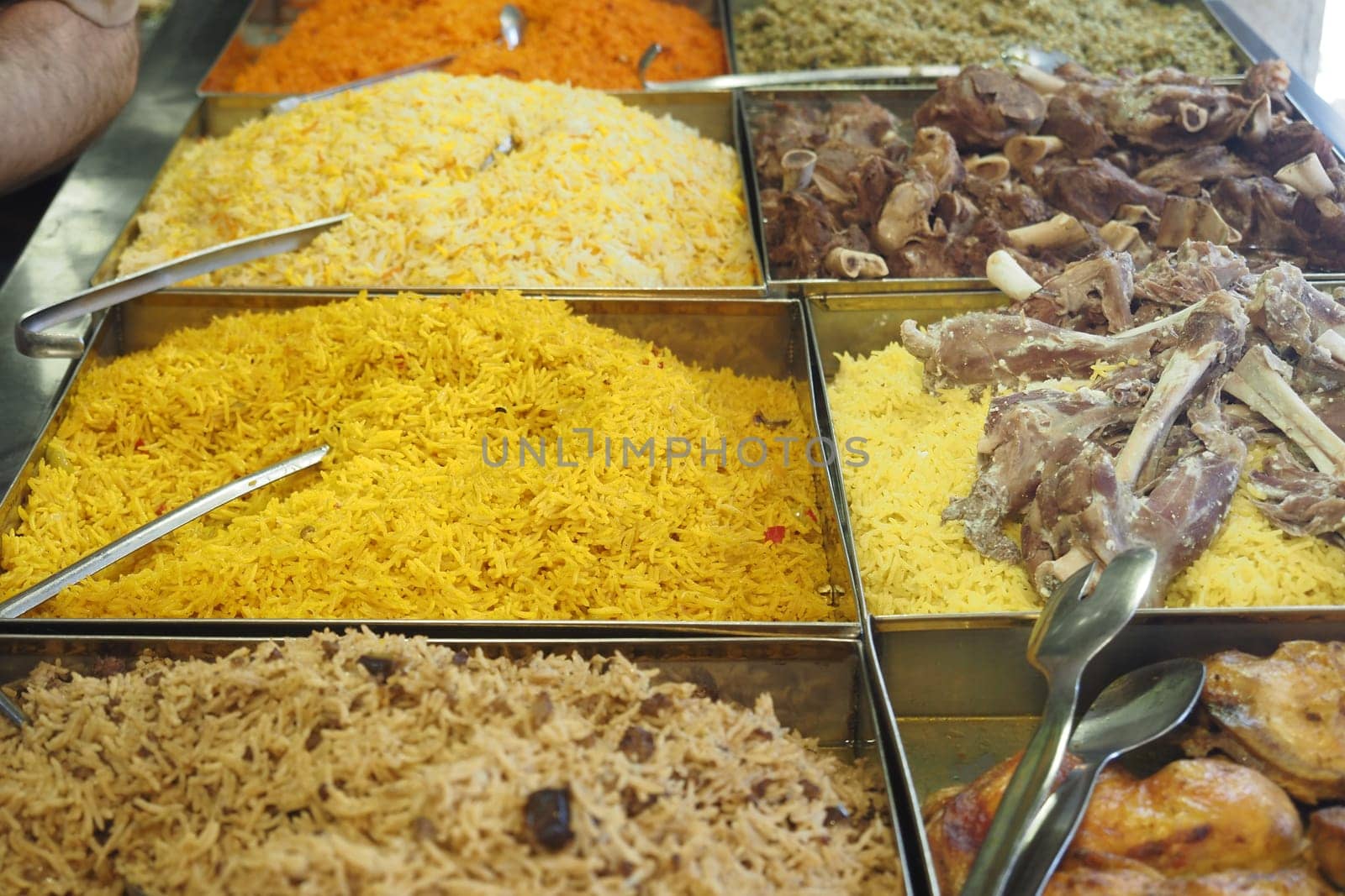 Vibrant varieties of rice available for purchase in a local market.