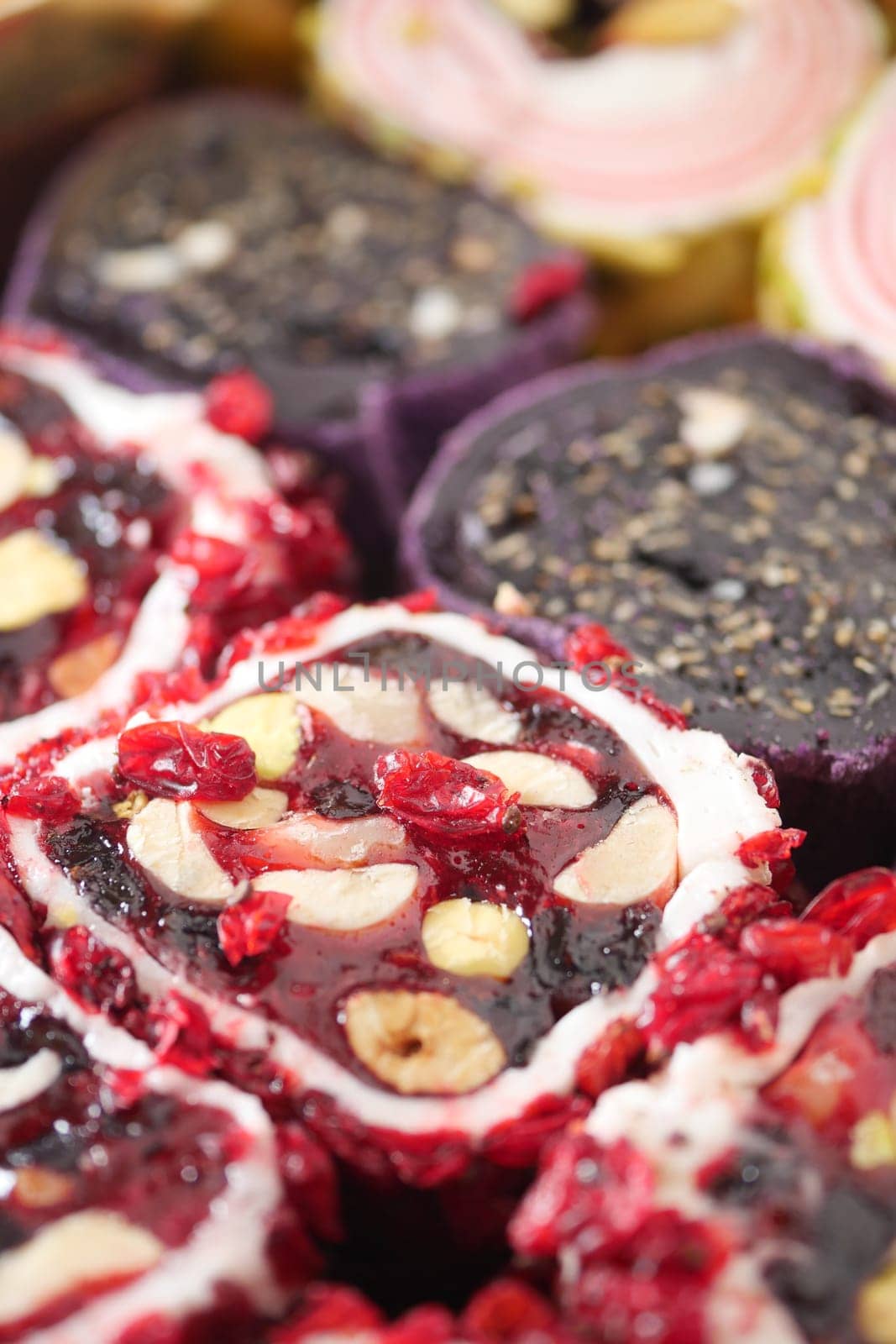 Assorted Colorful Turkish Delight Cubes on a White Plate,