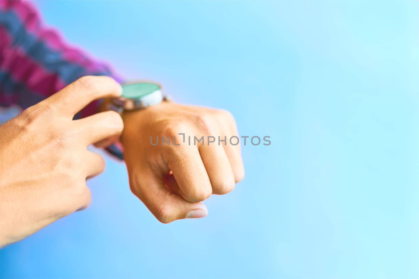 Concept for business, omnichannel, multi payment, lifestyle using and other. Smartwatch - modern digital gadget with empty display, copy space. Blue background