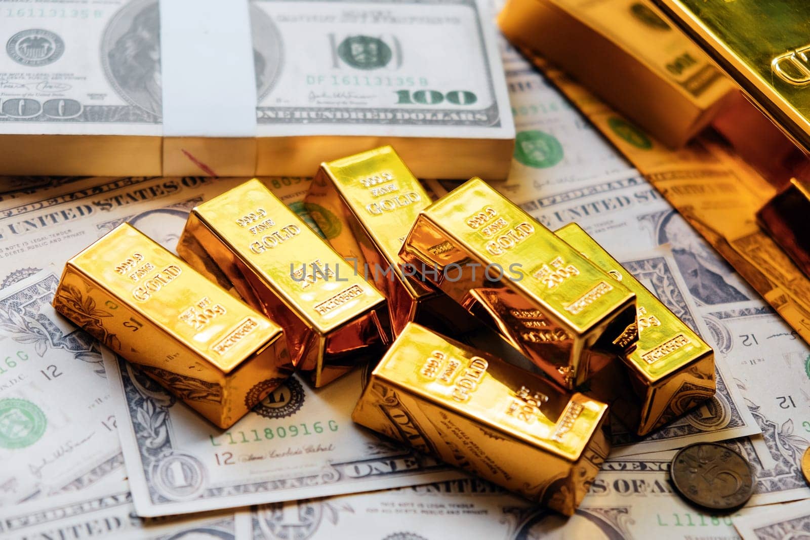Gold bars and dollar banknotes. Business and finance investment concept.