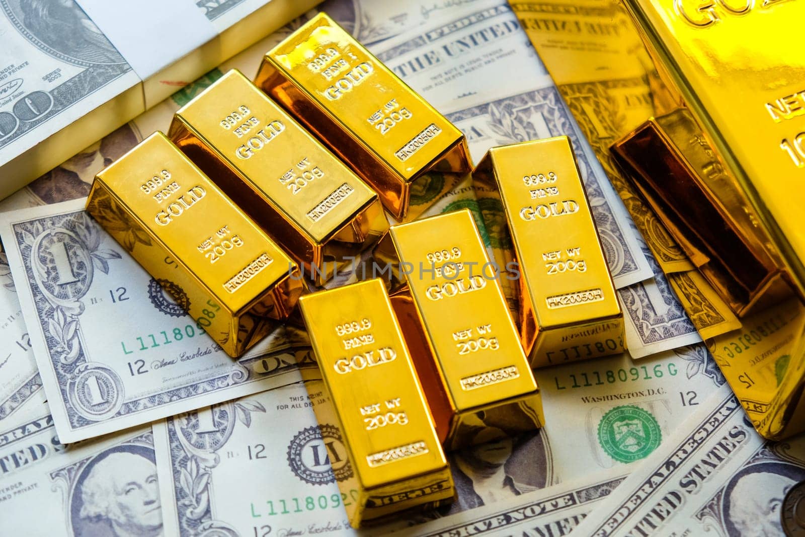Gold bars and dollar banknotes. Business and finance investment concept.