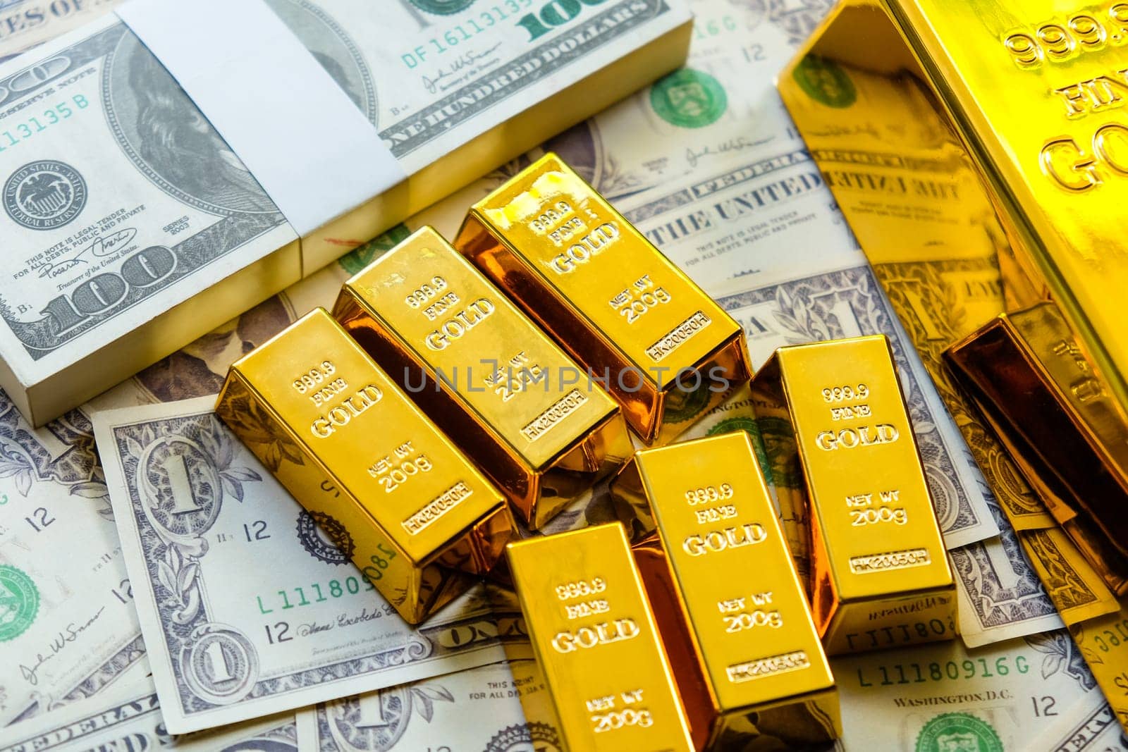 Gold bars and dollar banknotes. Business and finance investment concept.