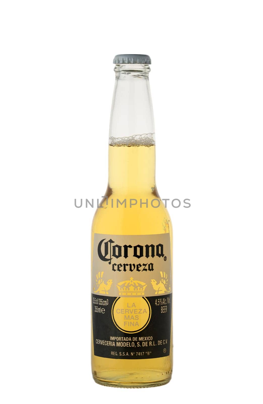 Gaziveren Cyprus -13.03.2025 Beer Corona Friends savor a crisp drink while basking in the sun, creating memorable moments by the shimmering ocean waves.