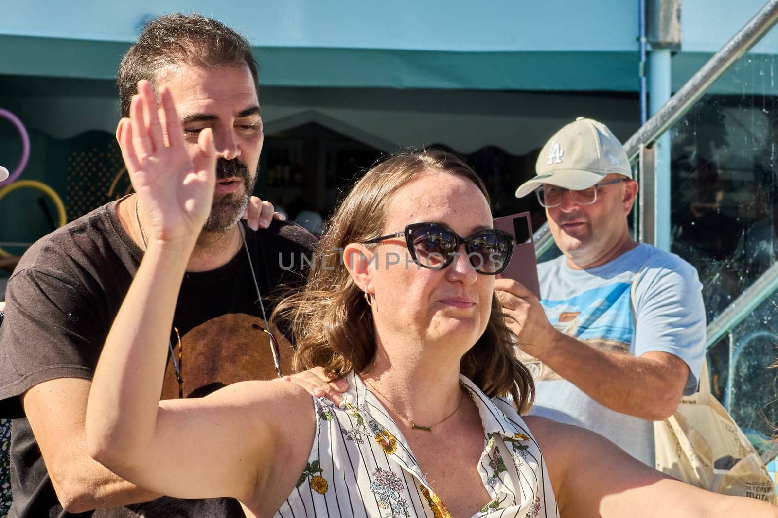 Catania. Italy - March 11, 2025: Close-up of a diverse group sharing enthusiastic moments outdoors, participating actively and connecting through a dynamic event.