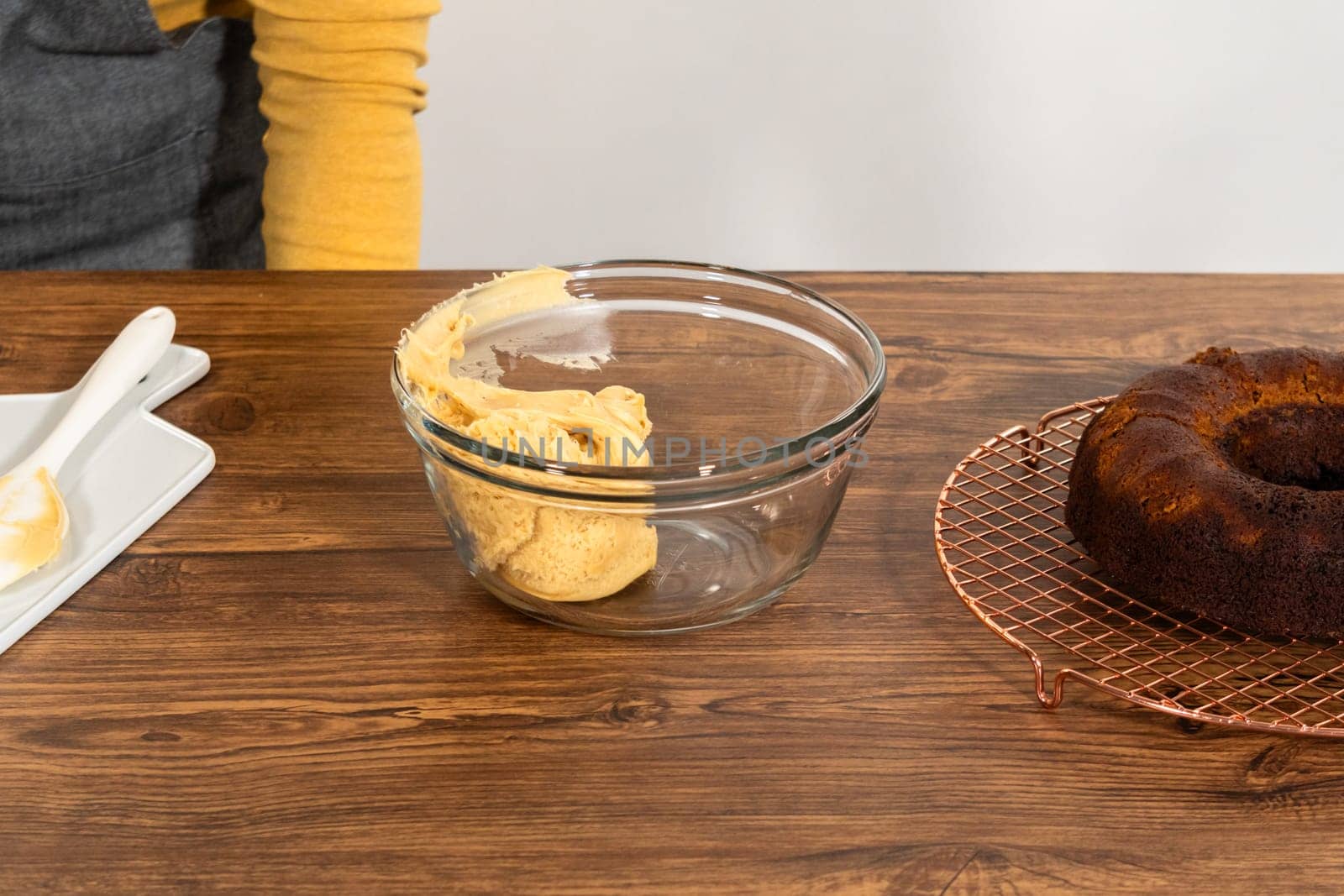 Whipping up salted caramel buttercream frosting for the gingerbread bundt cake.