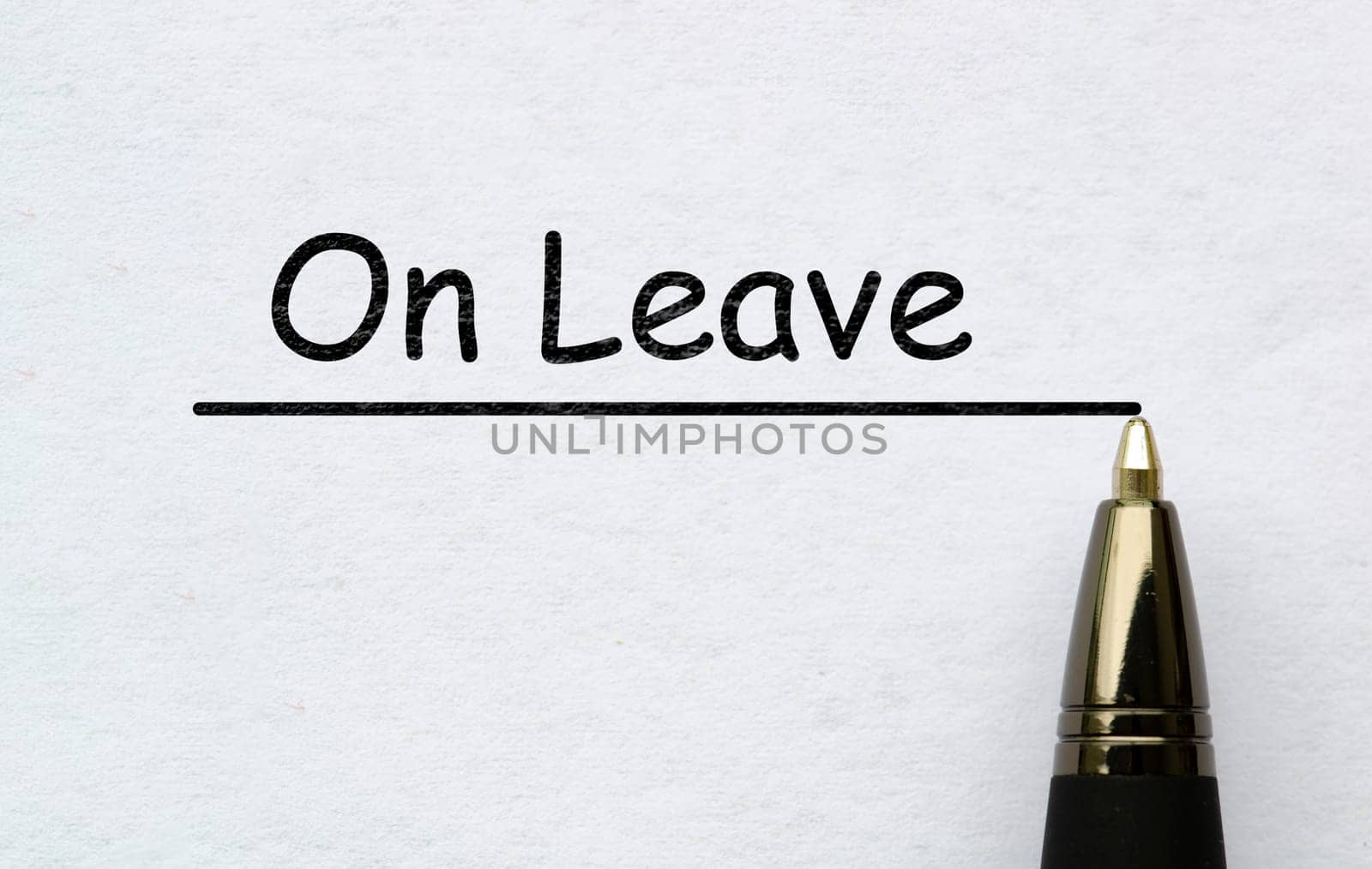 On leave text written on white paper. Vacation concept.