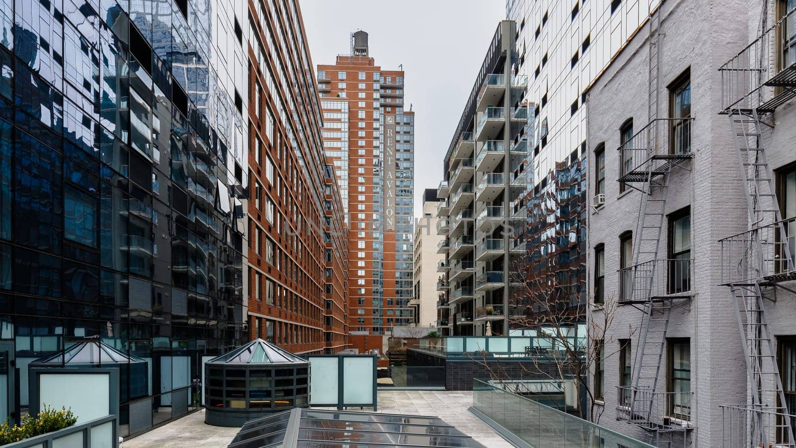 Manhattan, New York, USA - February 16, 2024: Detail of typical apartment building architecture on a gray winter day
