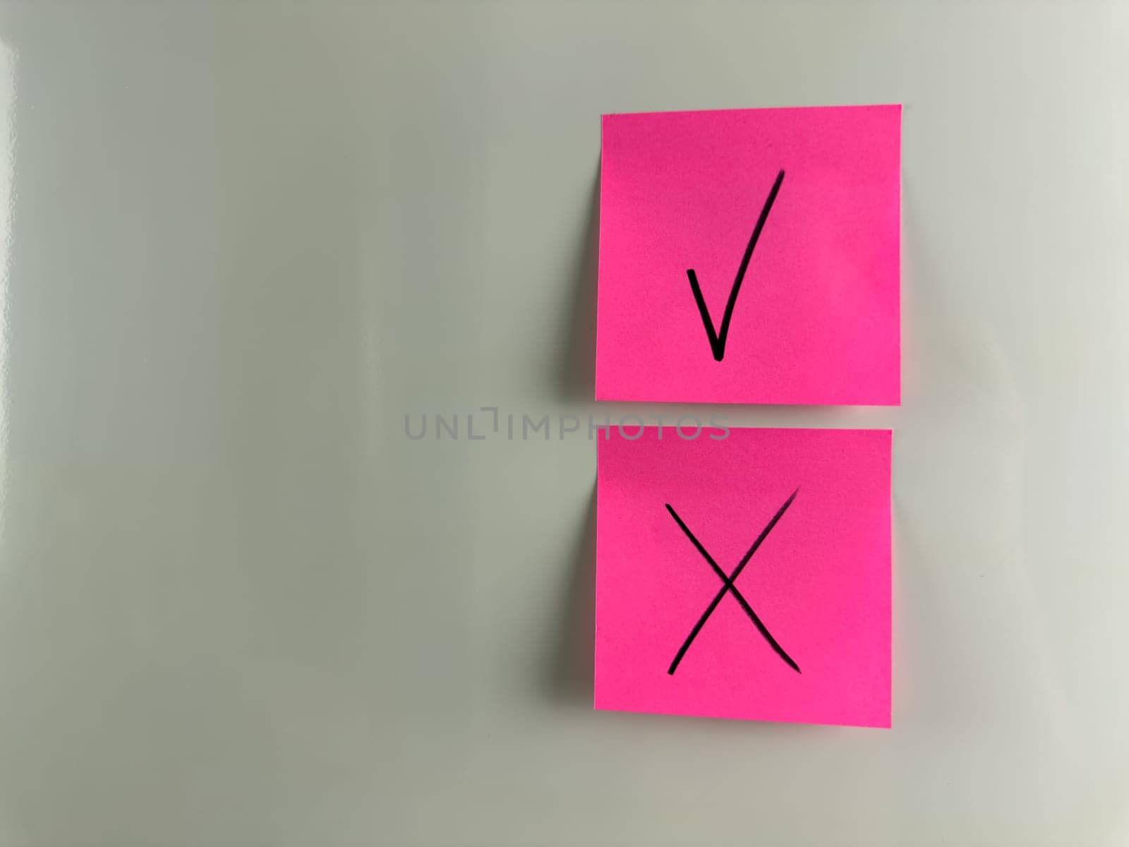 Choose check mark or cross to answer question. Choice and decision making concept with special icons on sticky notes. Answer and mark the right and wrong answer