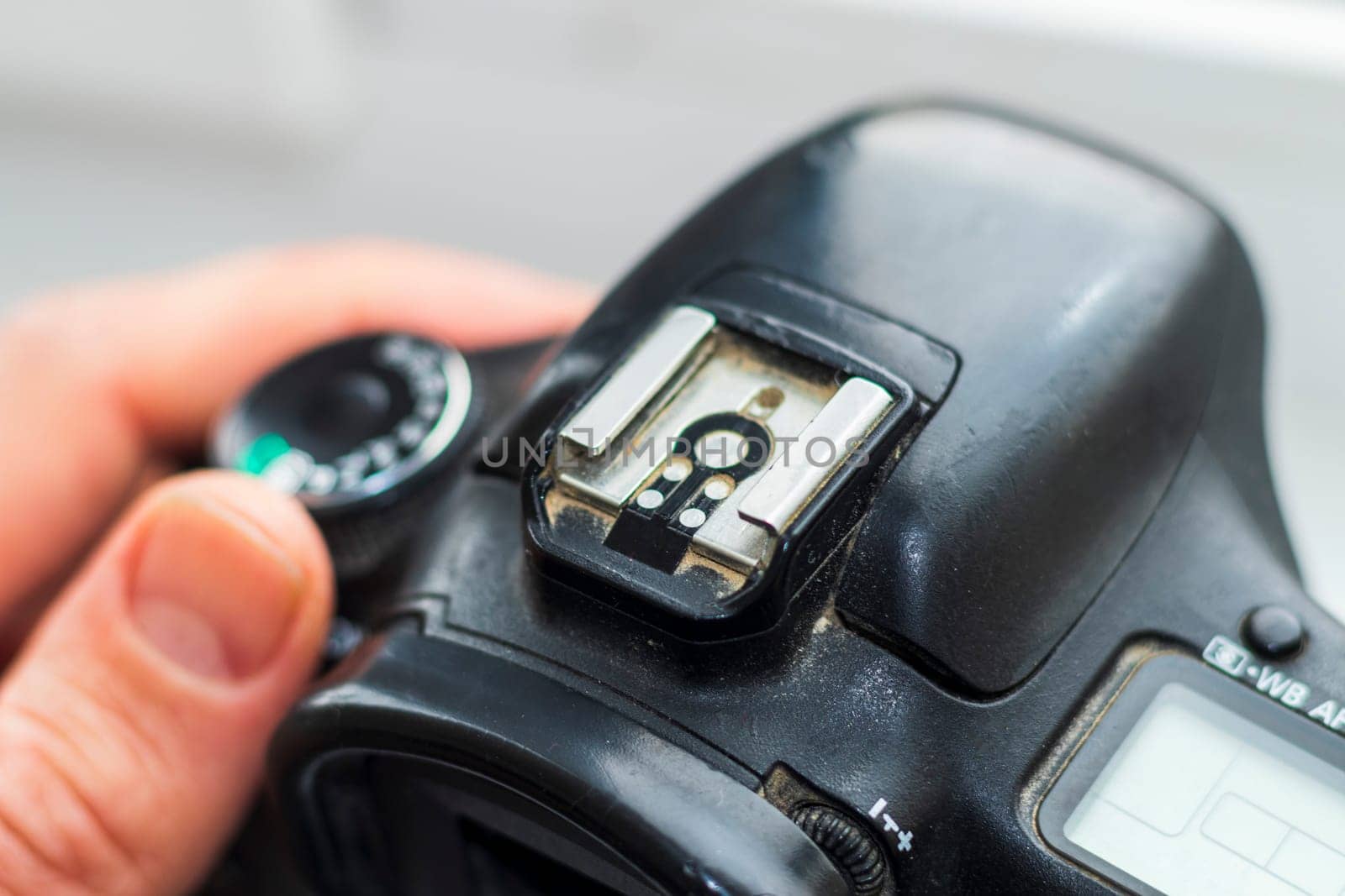 Close up shot of partially damaged, worn out camera body