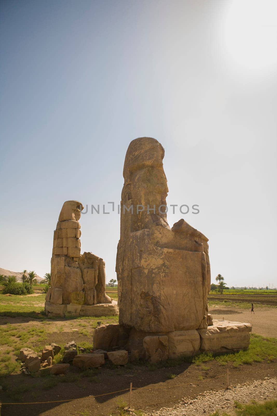 Twin statues of Colossi of Memnon, Luxor, Egypt. Theban necropolis
