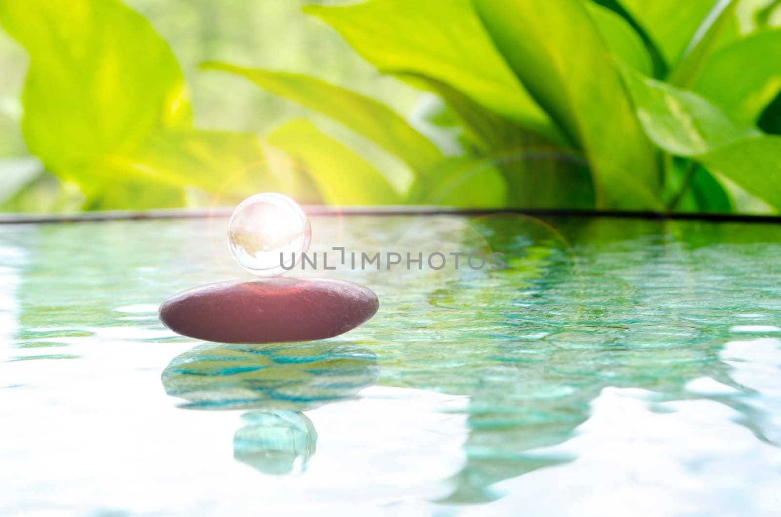Bright shining glass marble representing peace and harmony with customizable space for text of message. Peace concept.