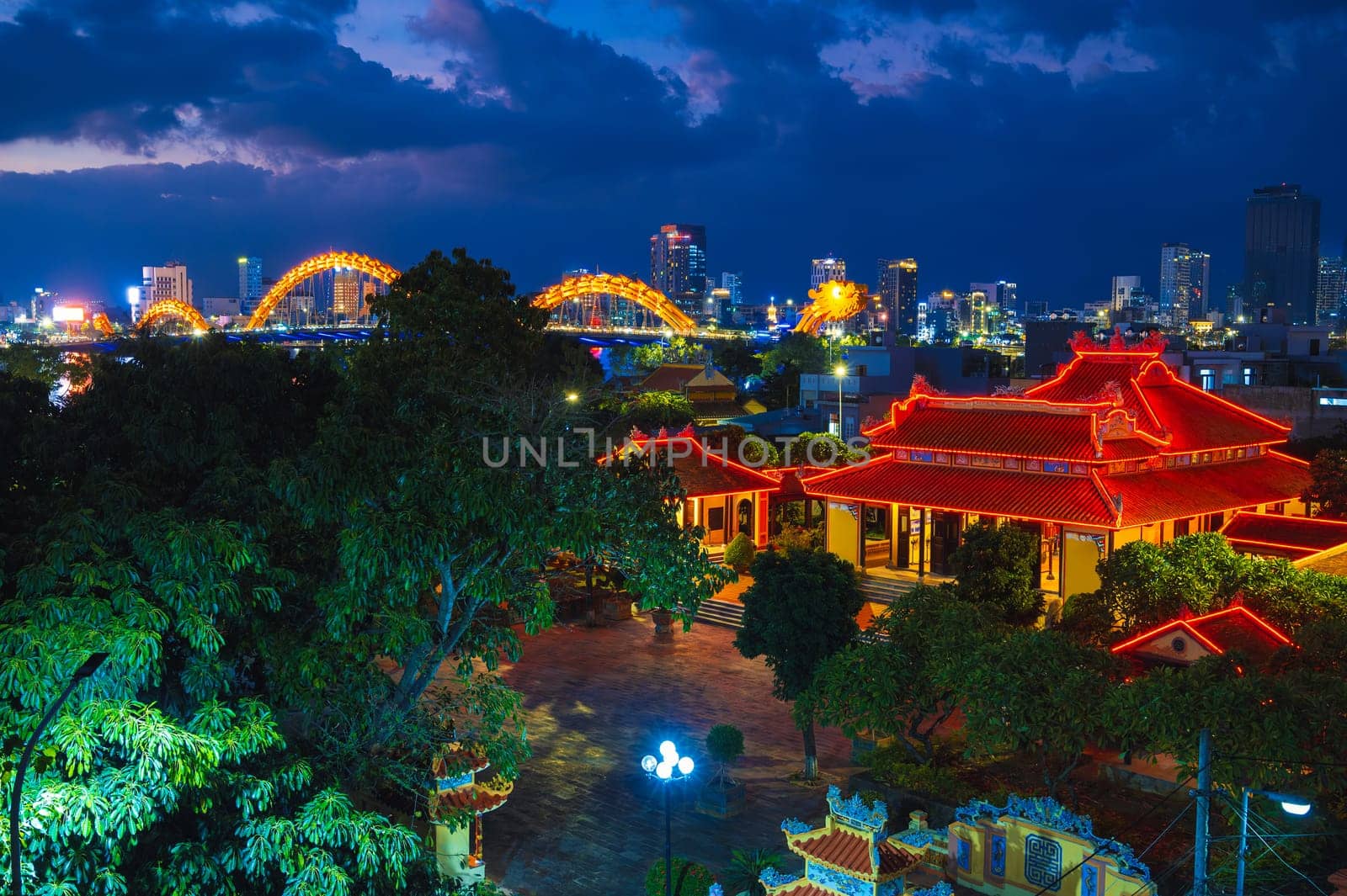 Da Nang city with Dragon Bridge in Vietnam. Panorama of the night city in Asia