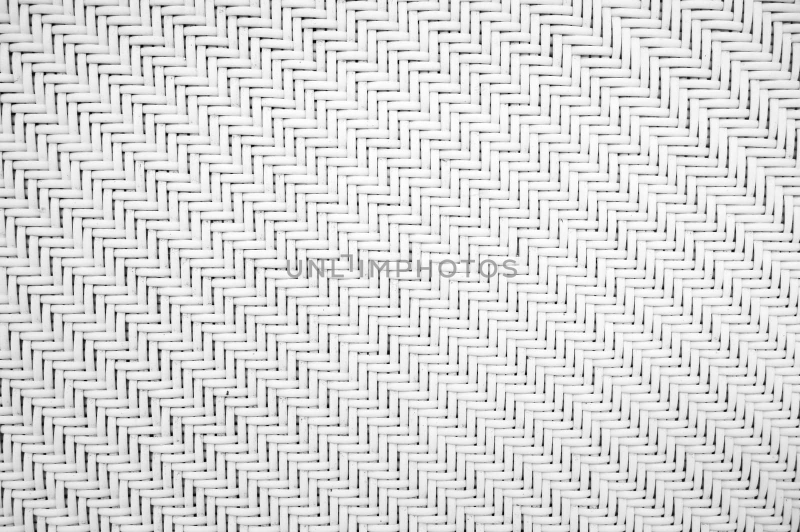 abstract white background with natural woven rattan texture. Braided wicker Pattern