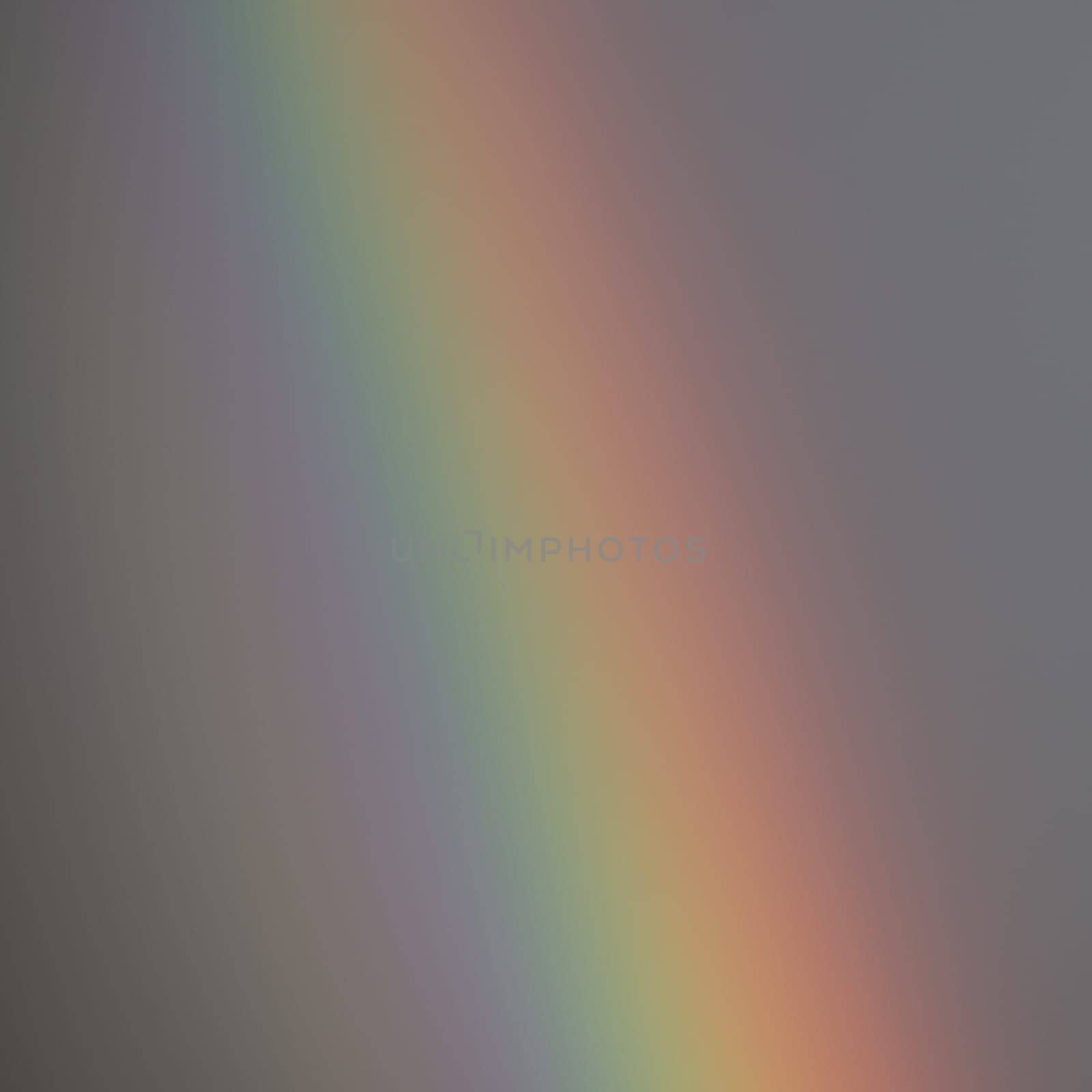 A rainbow against a grey sky in eastern Finland in summer