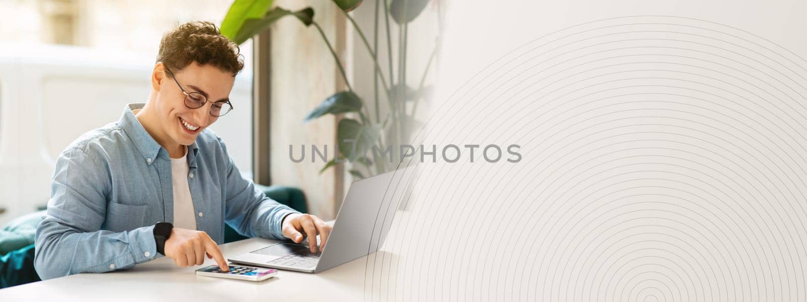 Happy young european guy student in glasses, typing on smartphone, laptop, work, study online, chatting in cafe. Online meeting app, modern lifestyle remotely, digital nomad