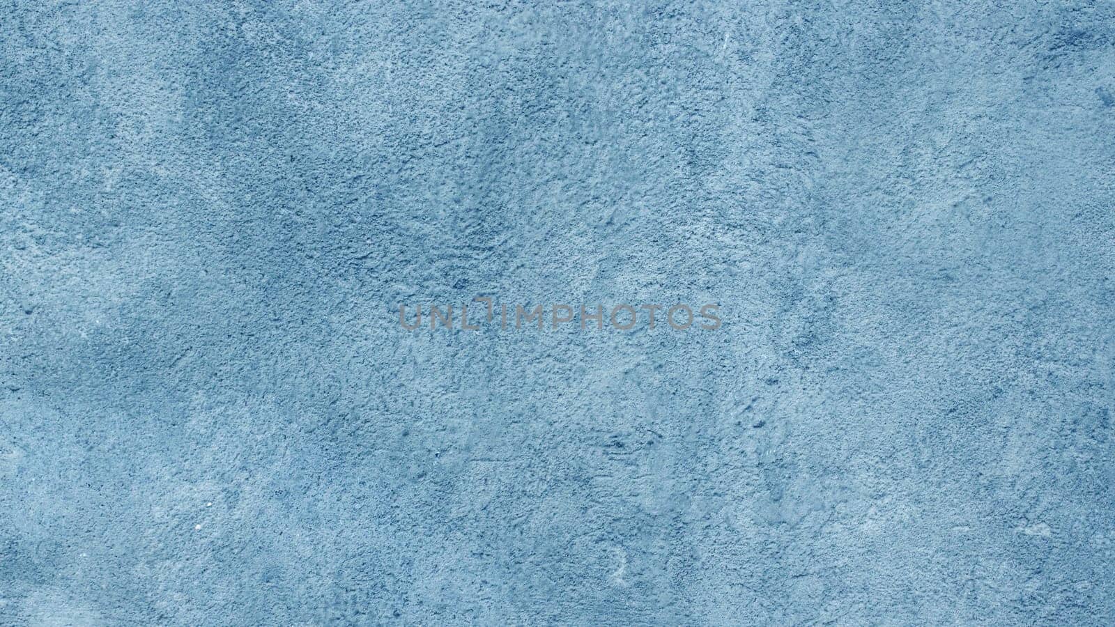 Close-up of an urban grunge textured background in blue.