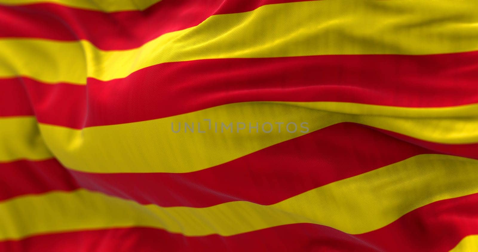 Detail of the Catalonia flag waving in the wind. Catalonia is an autonomous community of Spain. Four red stripes on a yellow field. 3d illustration render. Selective focus. Close-up