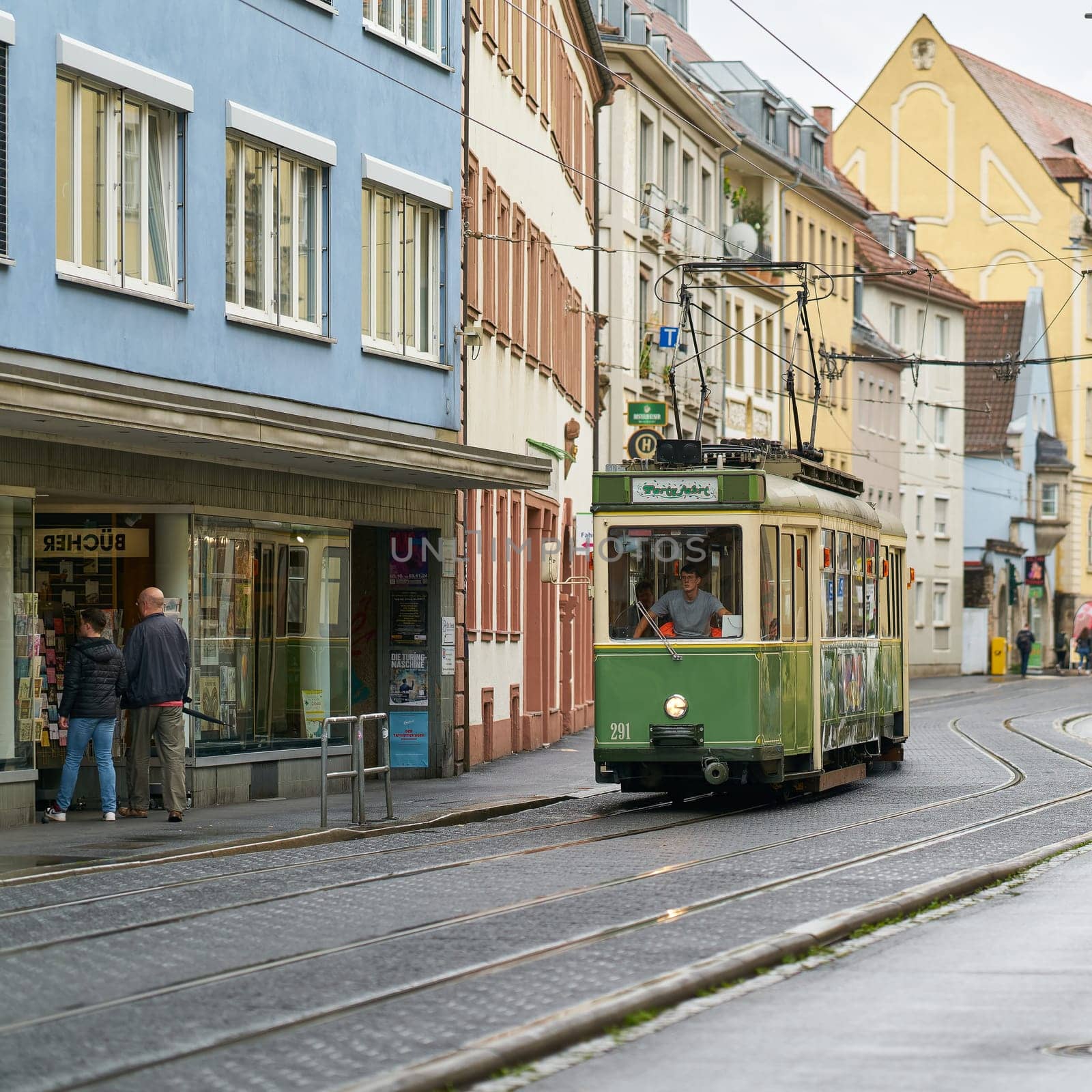 Wurzburg, Germany – September 26, 2024: The Schoppenexpress, a party train, Partybahn operated by Wurzburger Straßenbahn GmbH, traveling through Wurzburg