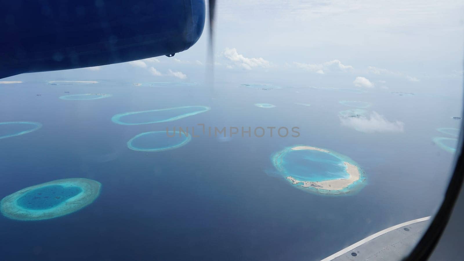 The breathtaking view of the maldives islands from a seaplane, showcasing the stunning atolls and turquoise waters, offers a unique perspective of this tropical paradise