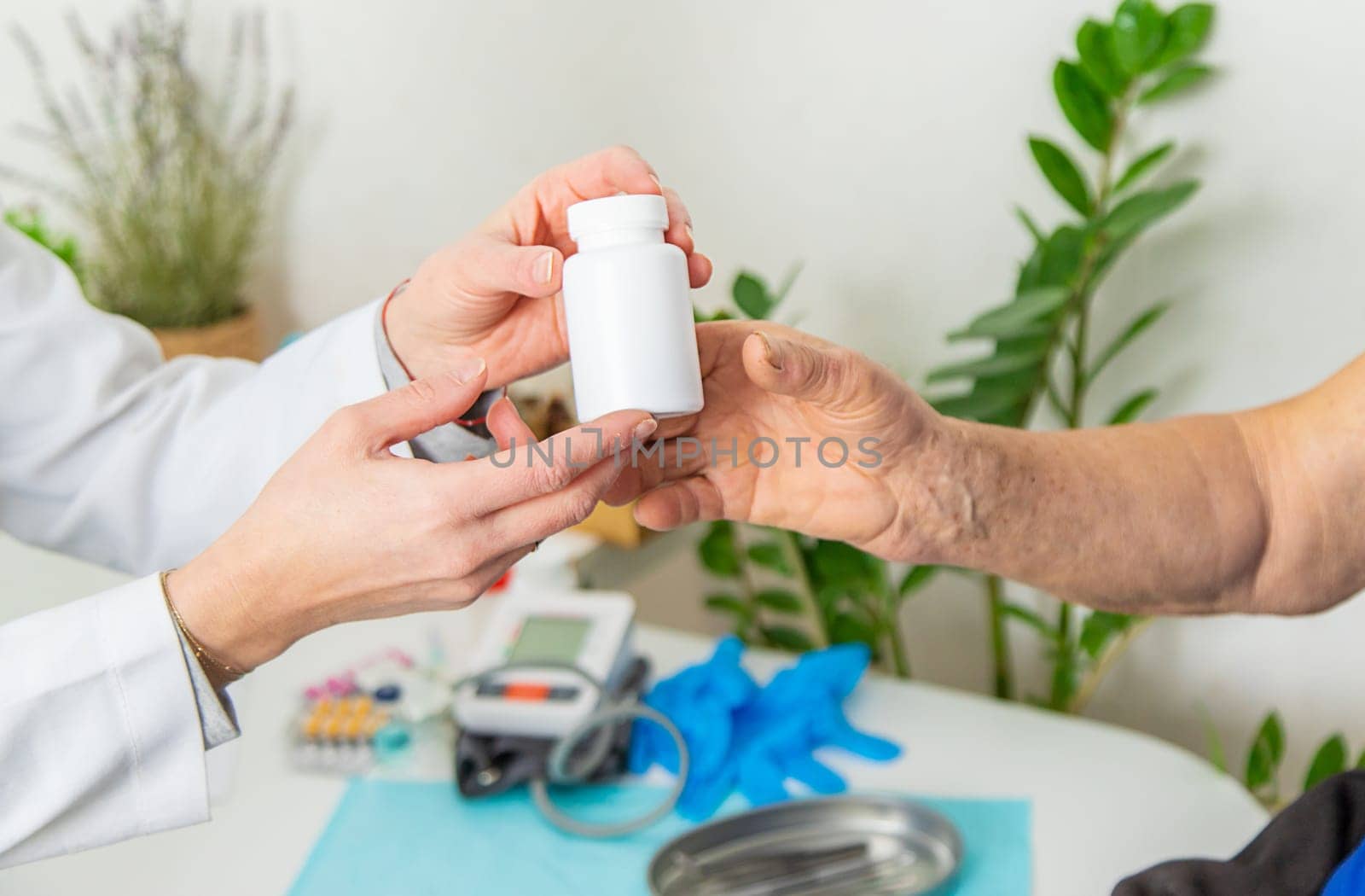 Elderly woman at a doctor appointment. Selective focus. People.