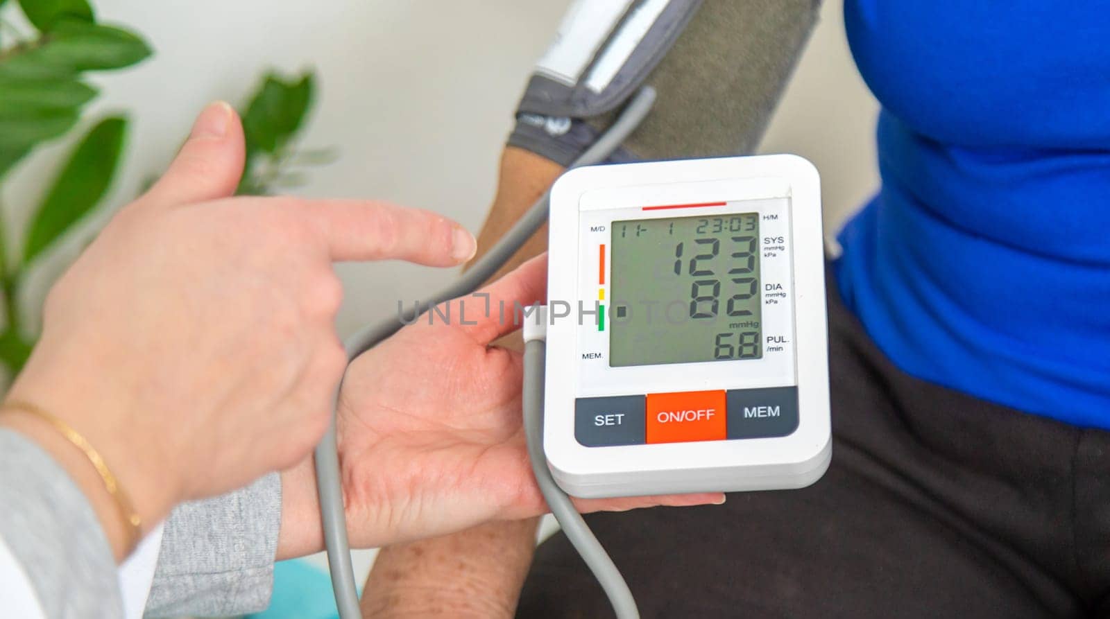 Elderly woman at a doctor appointment. Selective focus. People.