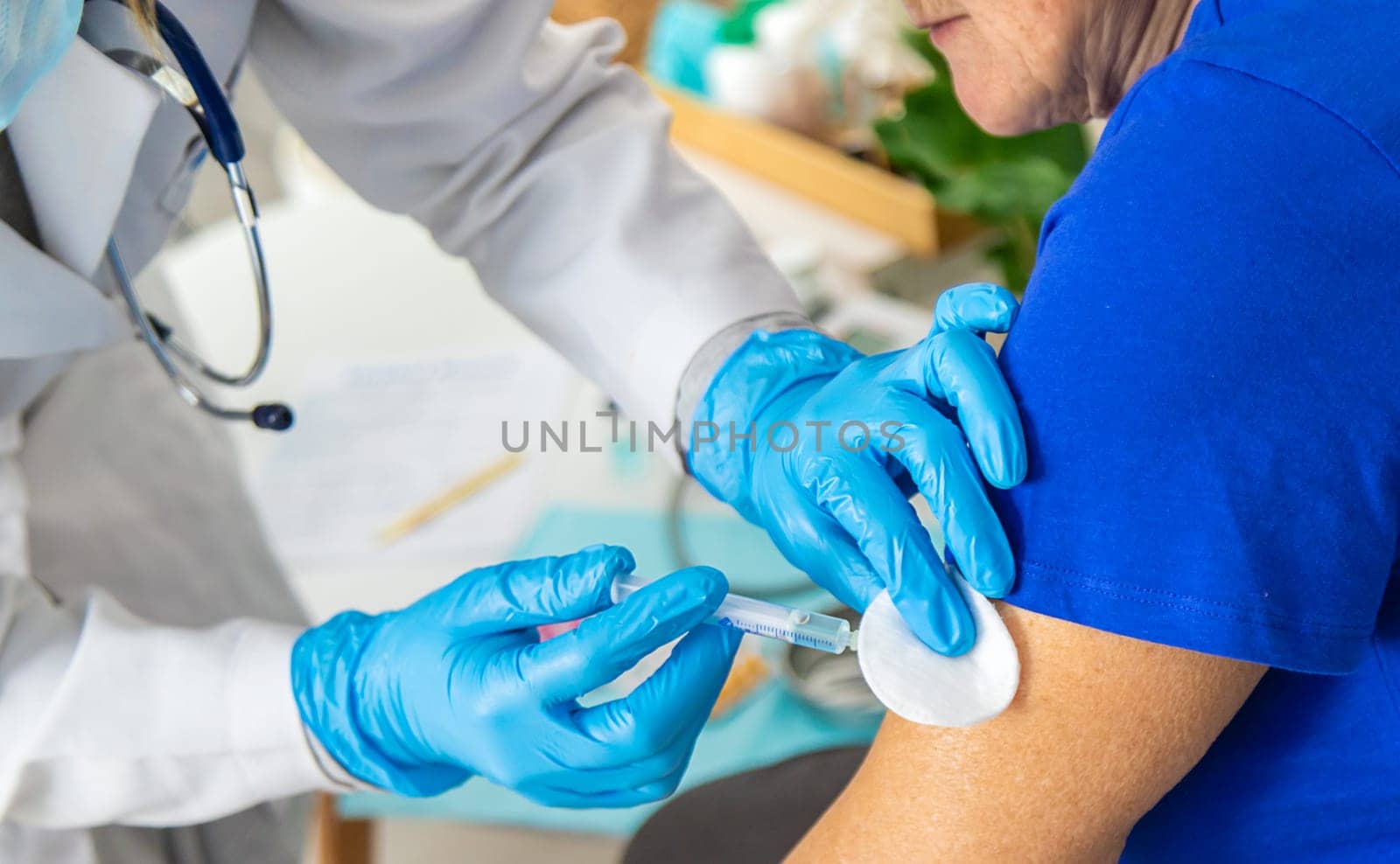 Elderly woman at a doctor appointment. Selective focus. People.