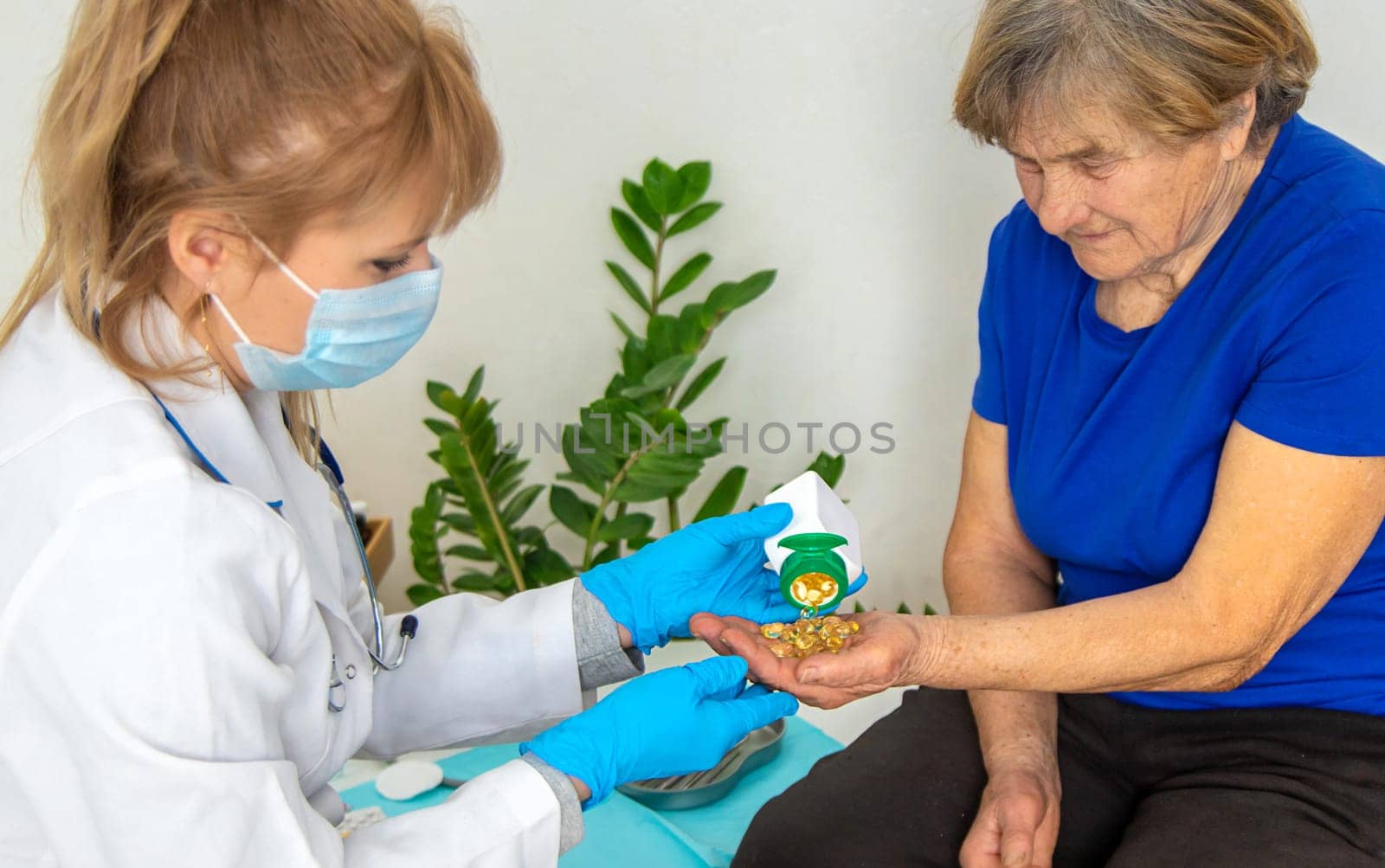 Elderly woman at a doctor appointment. Selective focus. People.