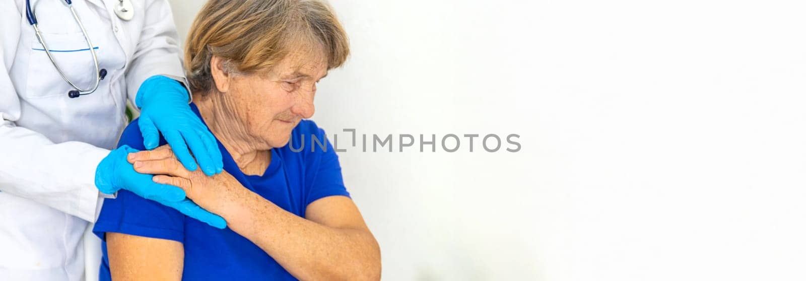 Elderly woman at a doctor appointment. Selective focus. People.