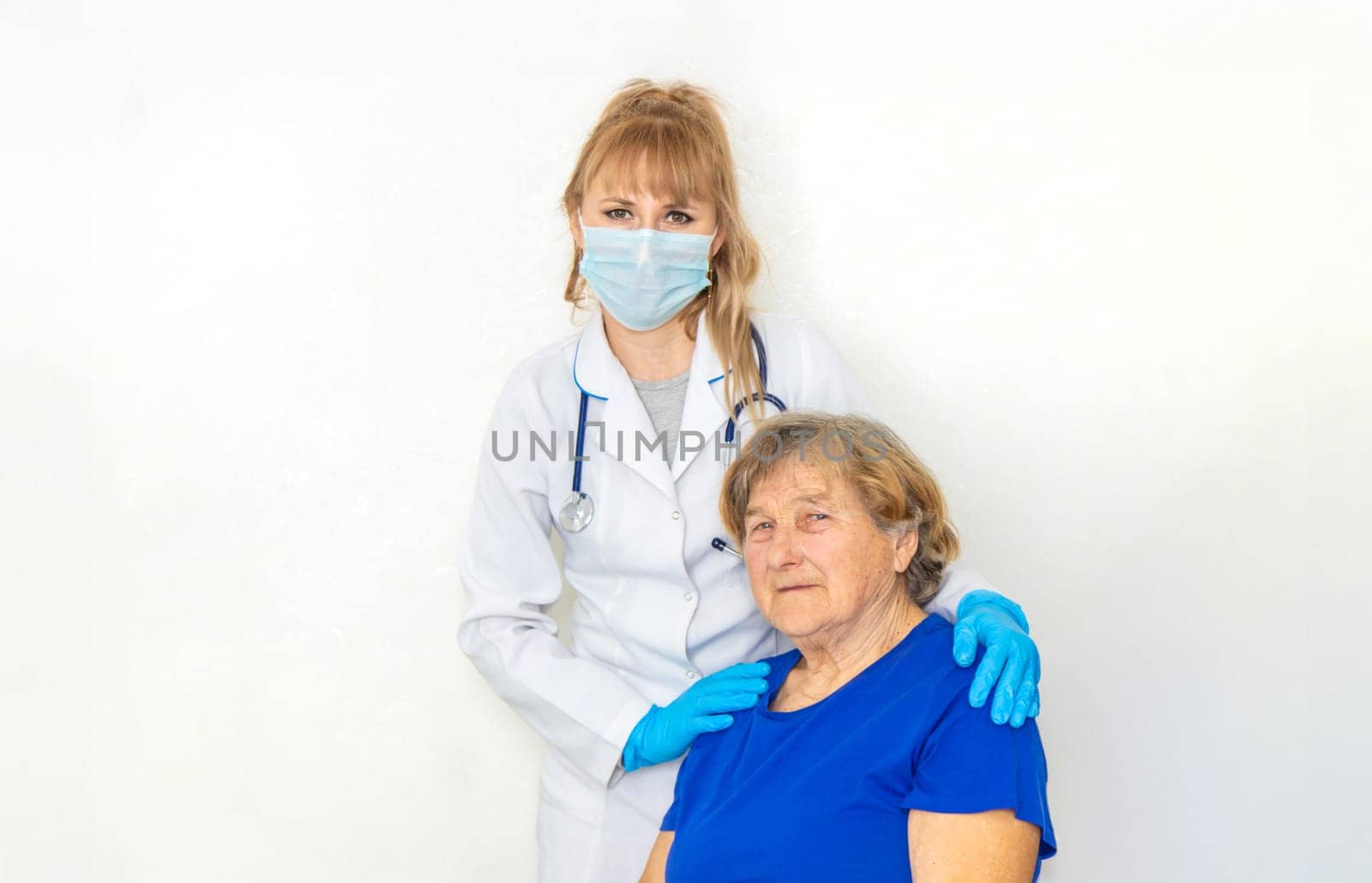 Elderly woman at a doctor appointment. Selective focus. People.