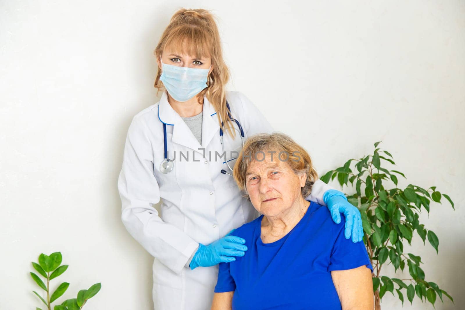 Elderly woman at a doctor appointment. Selective focus. People.
