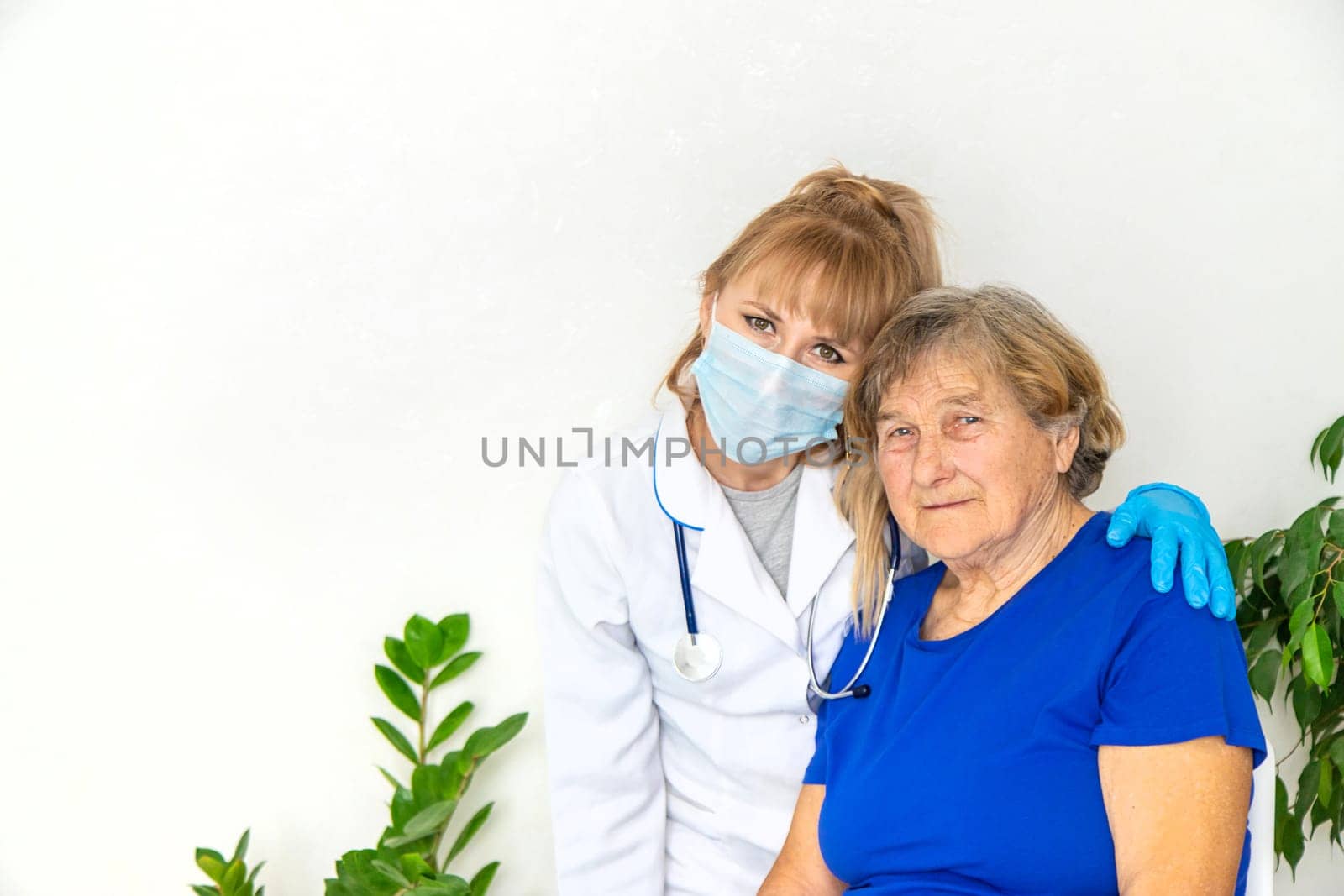 Elderly woman at a doctor appointment. Selective focus. People.