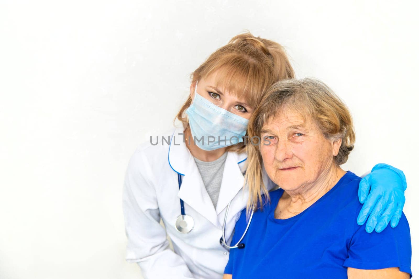 Elderly woman at a doctor appointment. Selective focus. People.