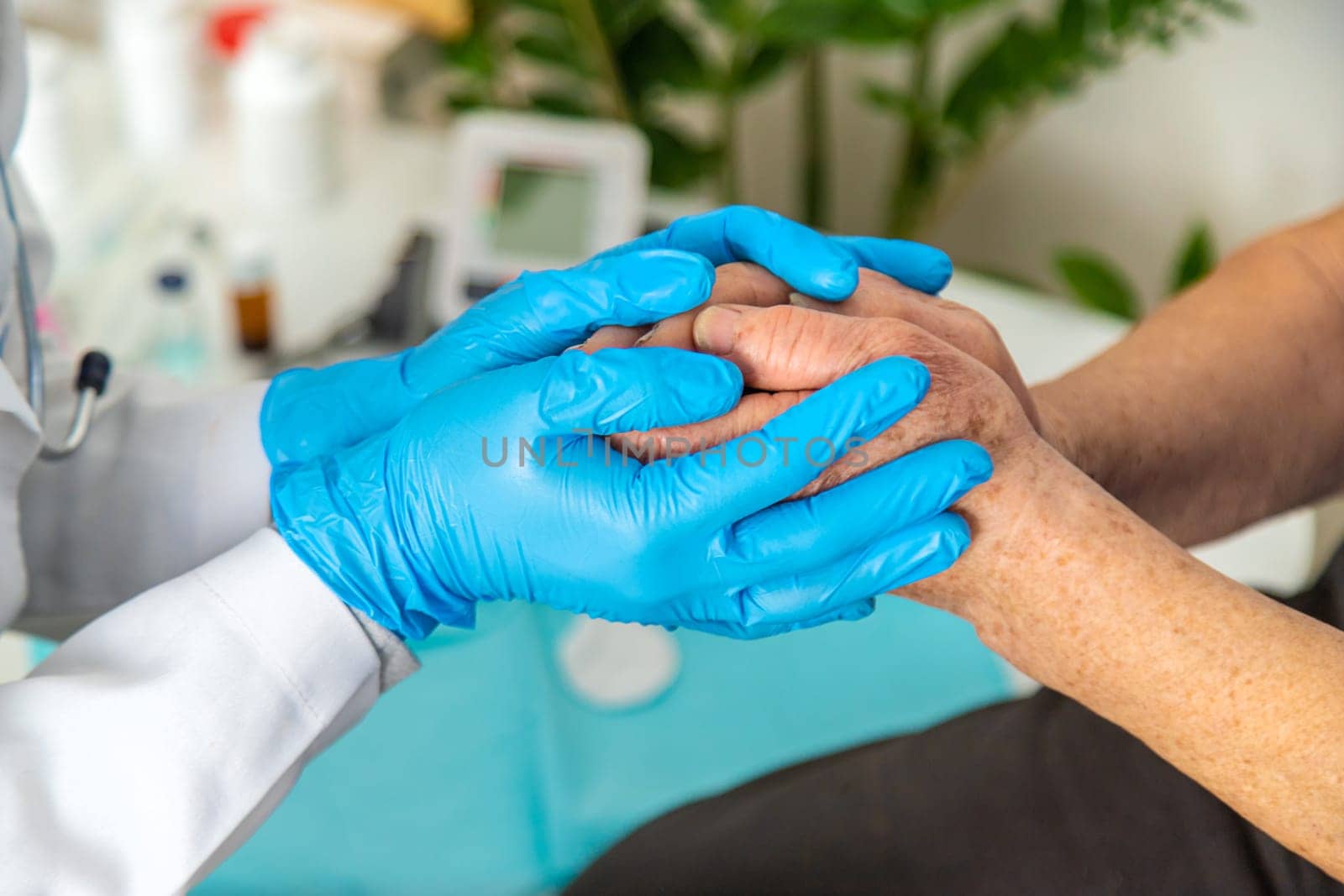 Elderly woman at a doctor appointment. Selective focus. People.