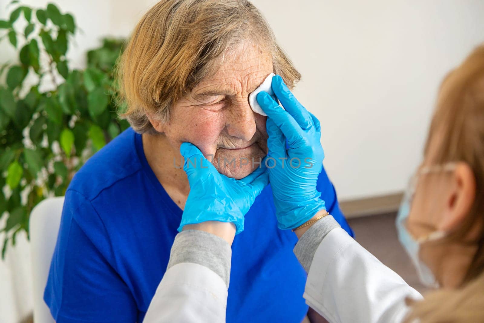 Elderly woman at a doctor appointment. Selective focus. People.