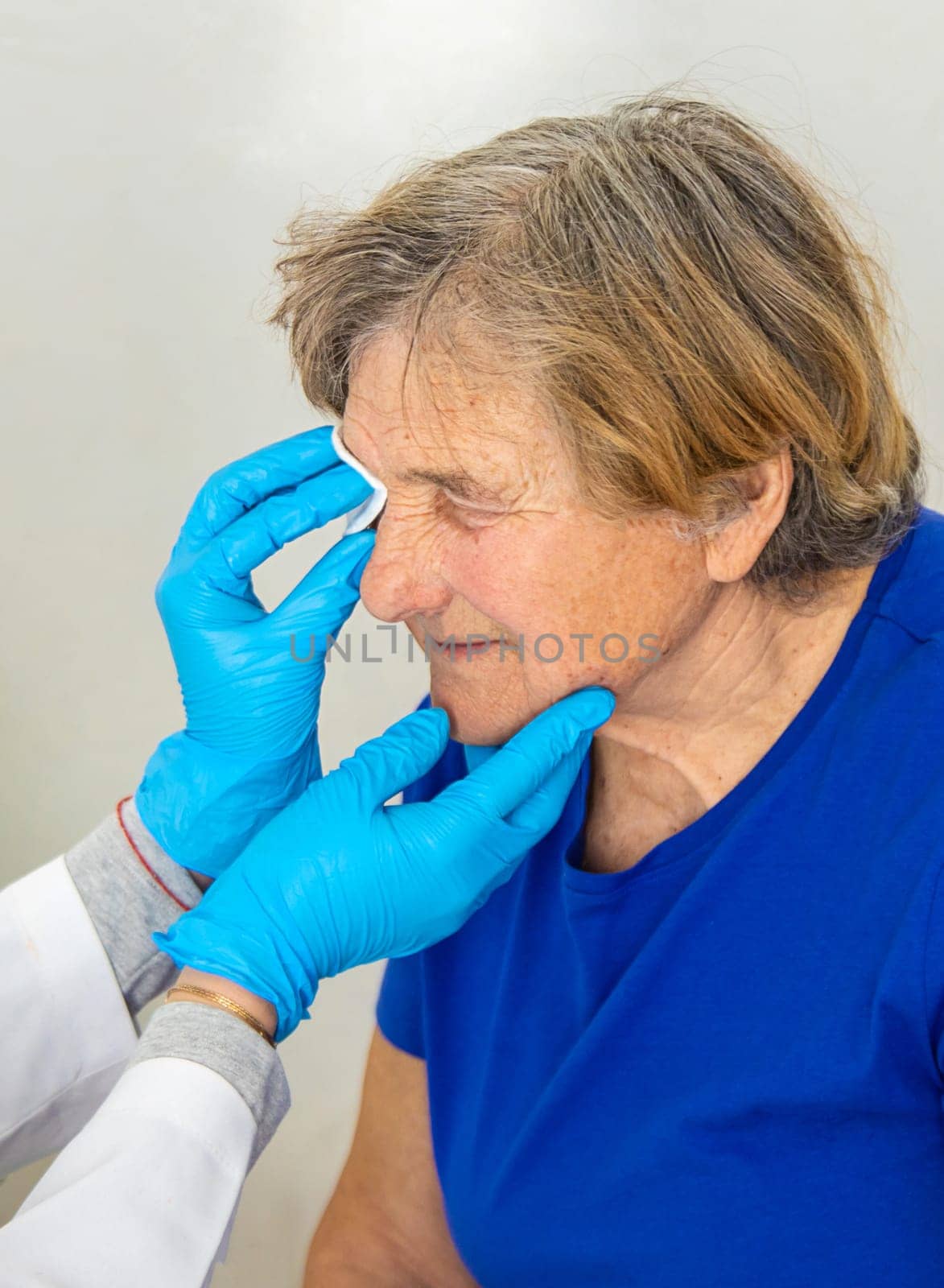 Elderly woman at a doctor appointment. Selective focus. People.