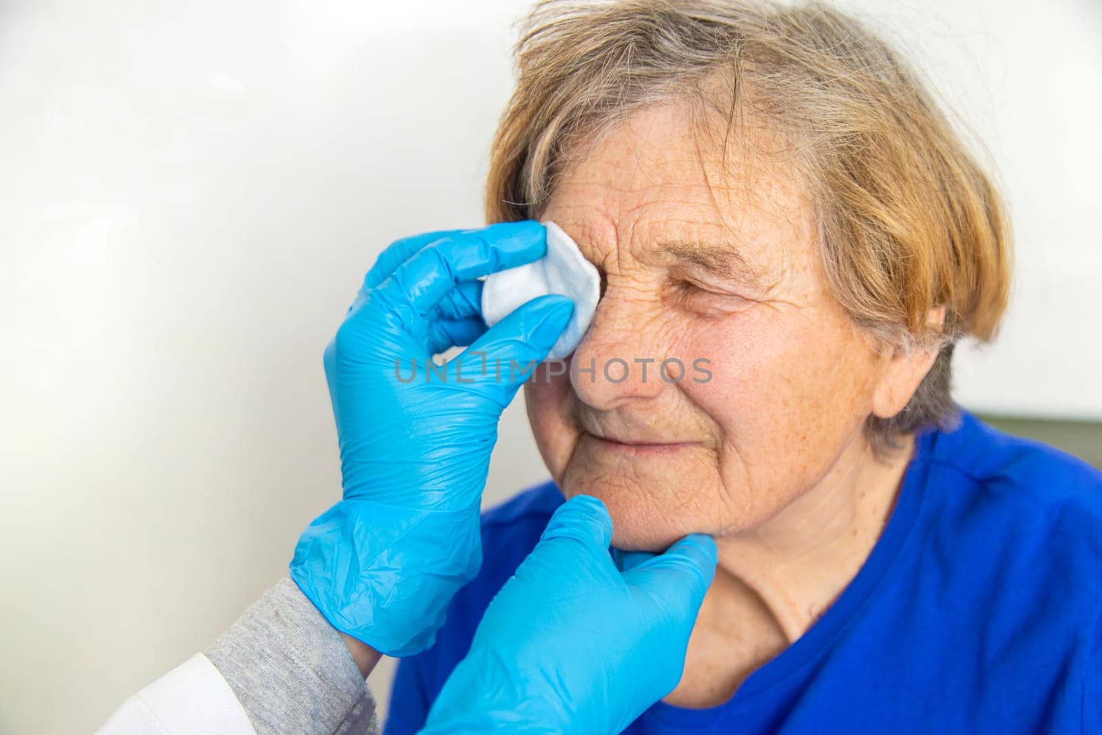 Elderly woman at a doctor appointment. Selective focus. People.