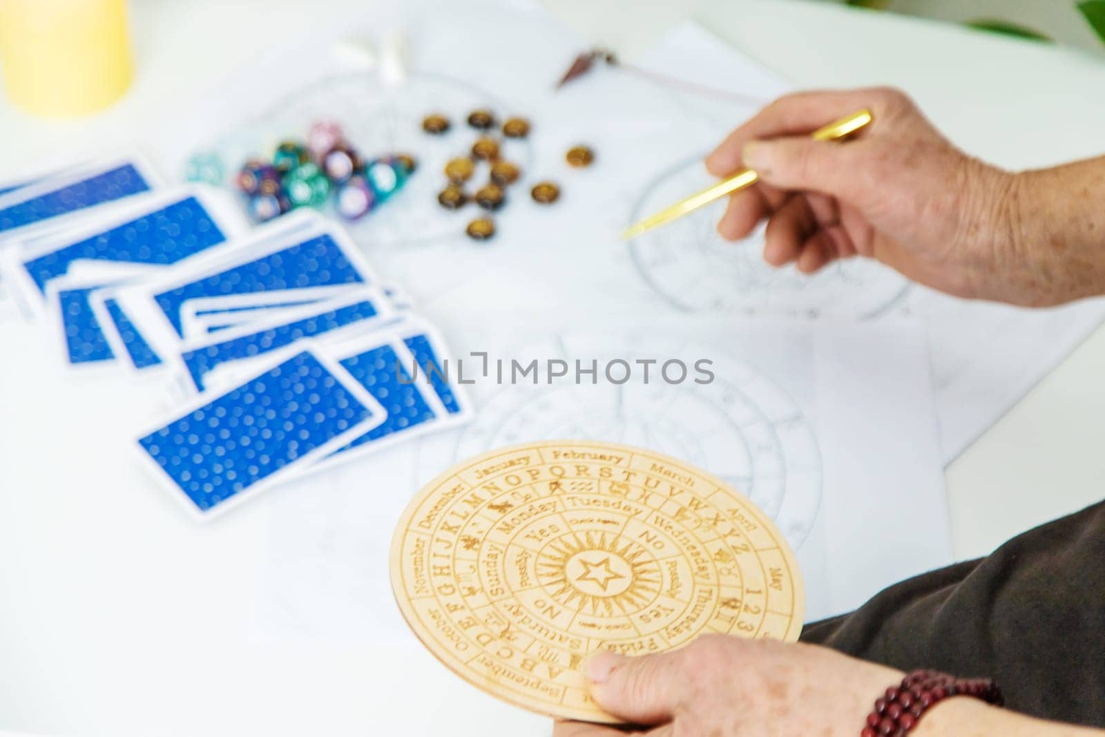Astrology and fortune telling old fortune teller. Selective focus. people.