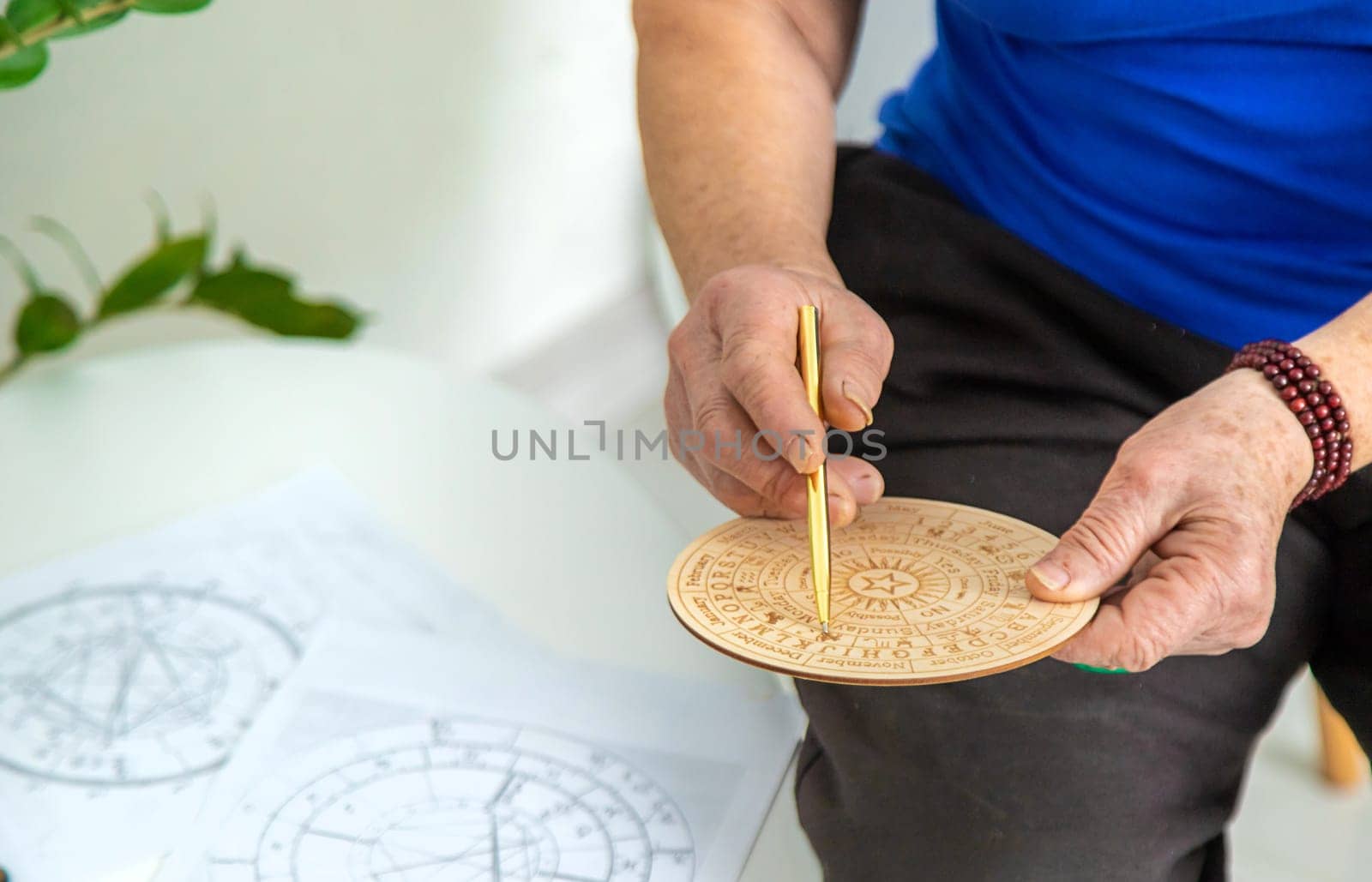 Astrology and fortune telling old fortune teller. Selective focus. people.