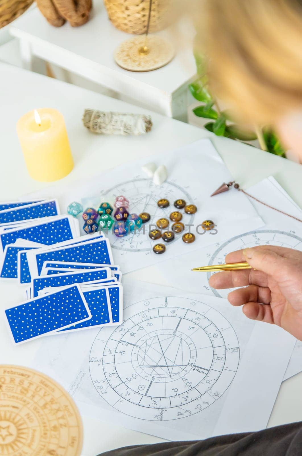 Astrology and fortune telling old fortune teller. Selective focus. people.