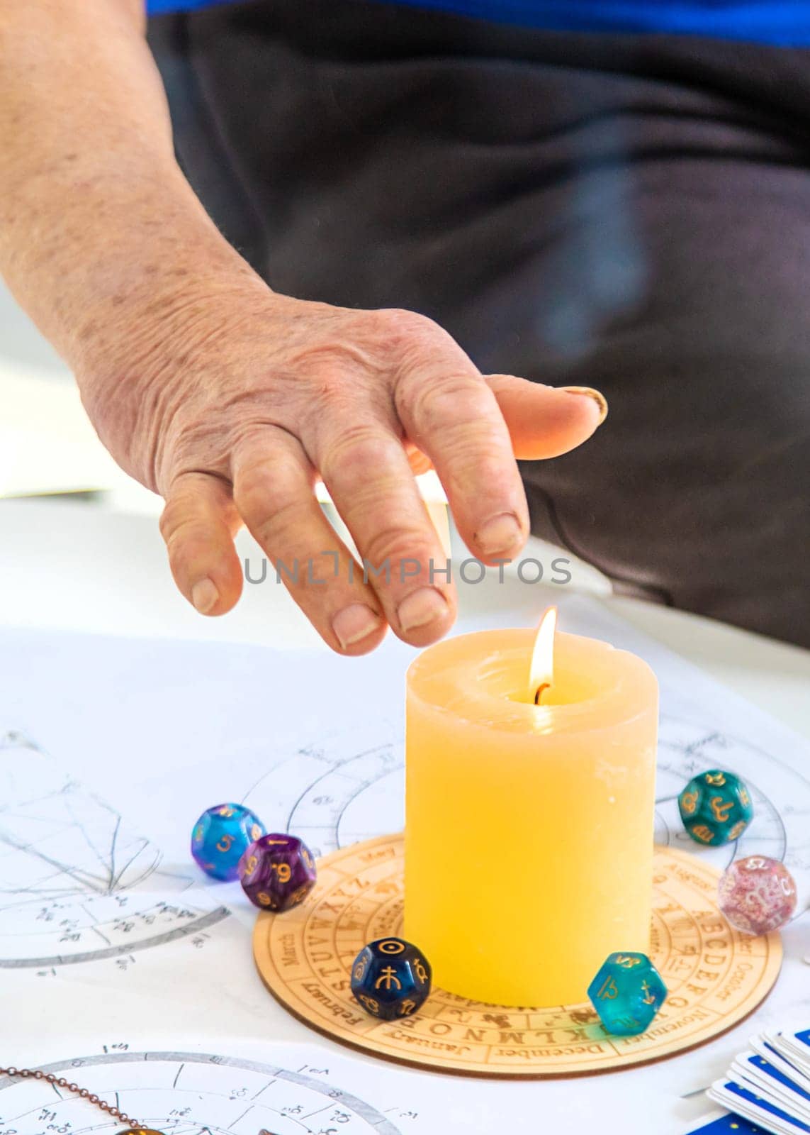 Astrology and fortune telling old fortune teller. Selective focus. people.