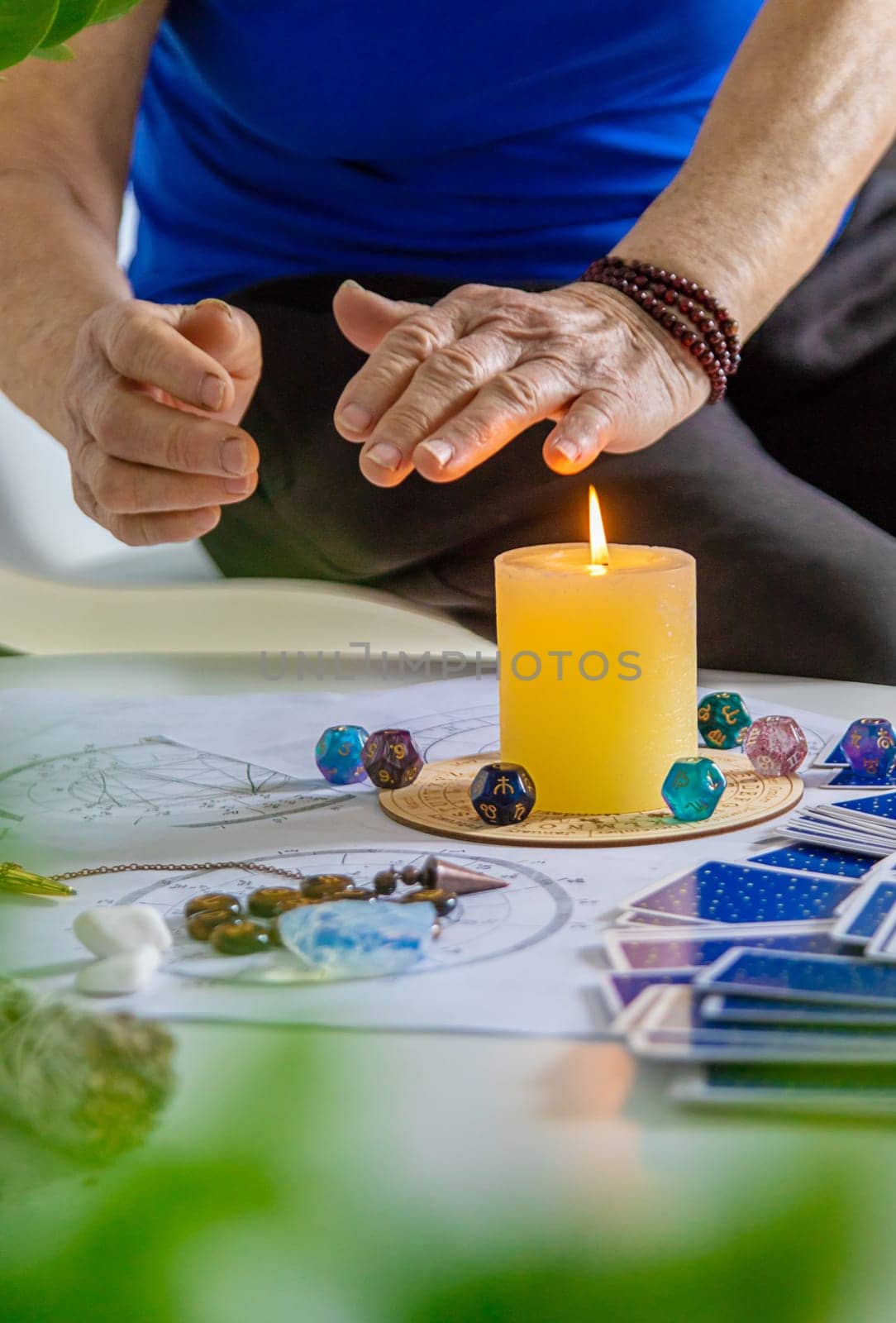 Astrology and fortune telling old fortune teller. Selective focus. people.