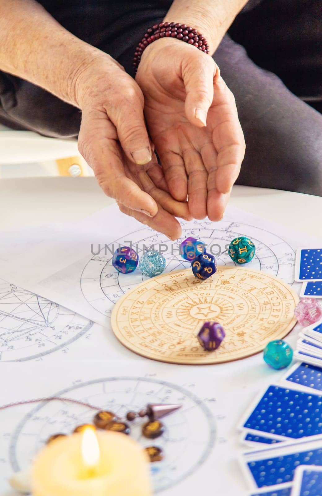 Astrology and fortune telling old fortune teller. Selective focus. people.