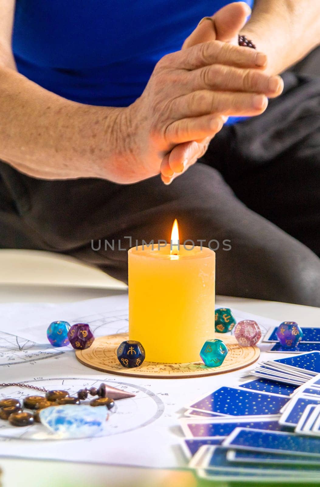Astrology and fortune telling old fortune teller. Selective focus. people.