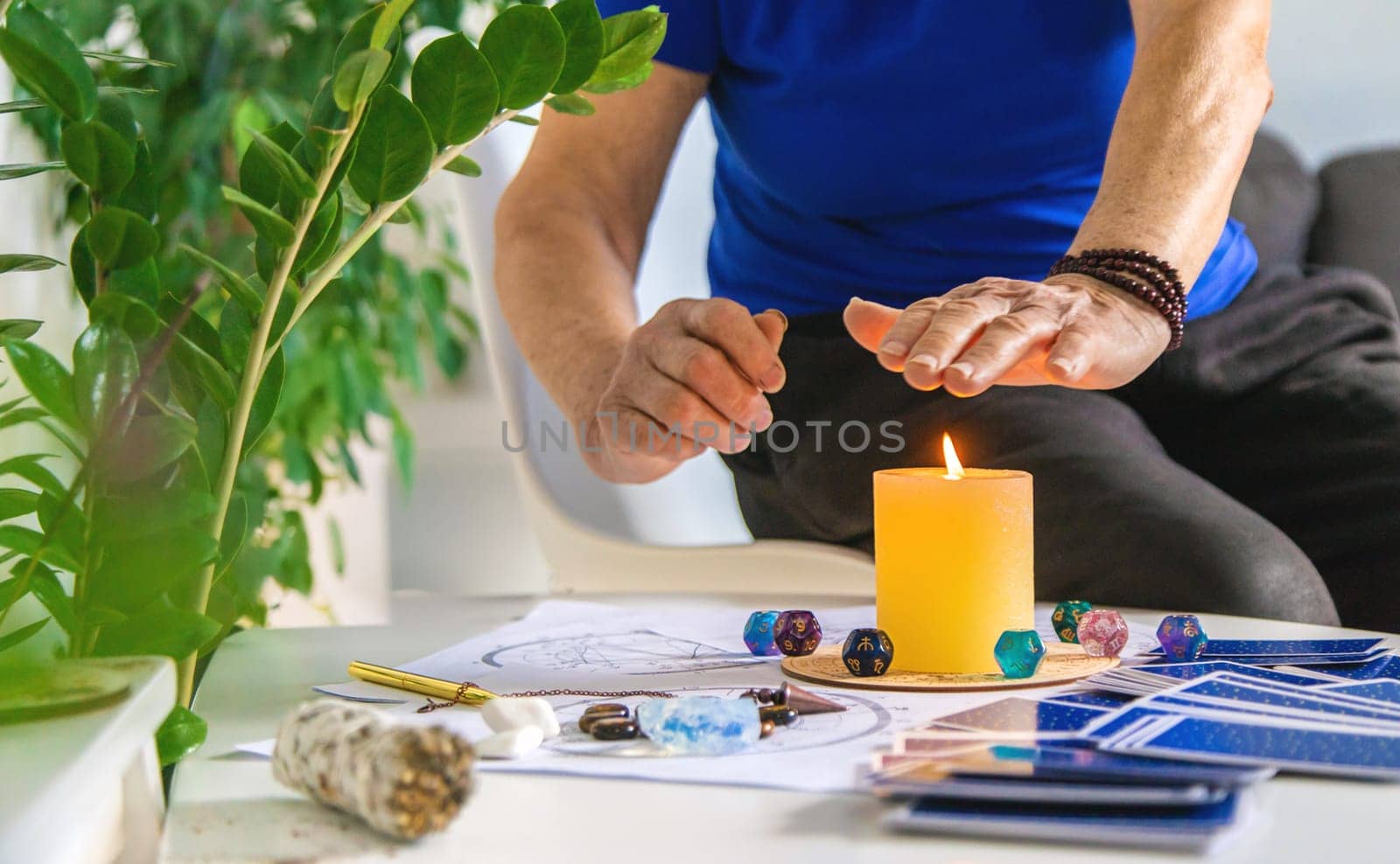 Astrology and fortune telling old fortune teller. Selective focus. people.