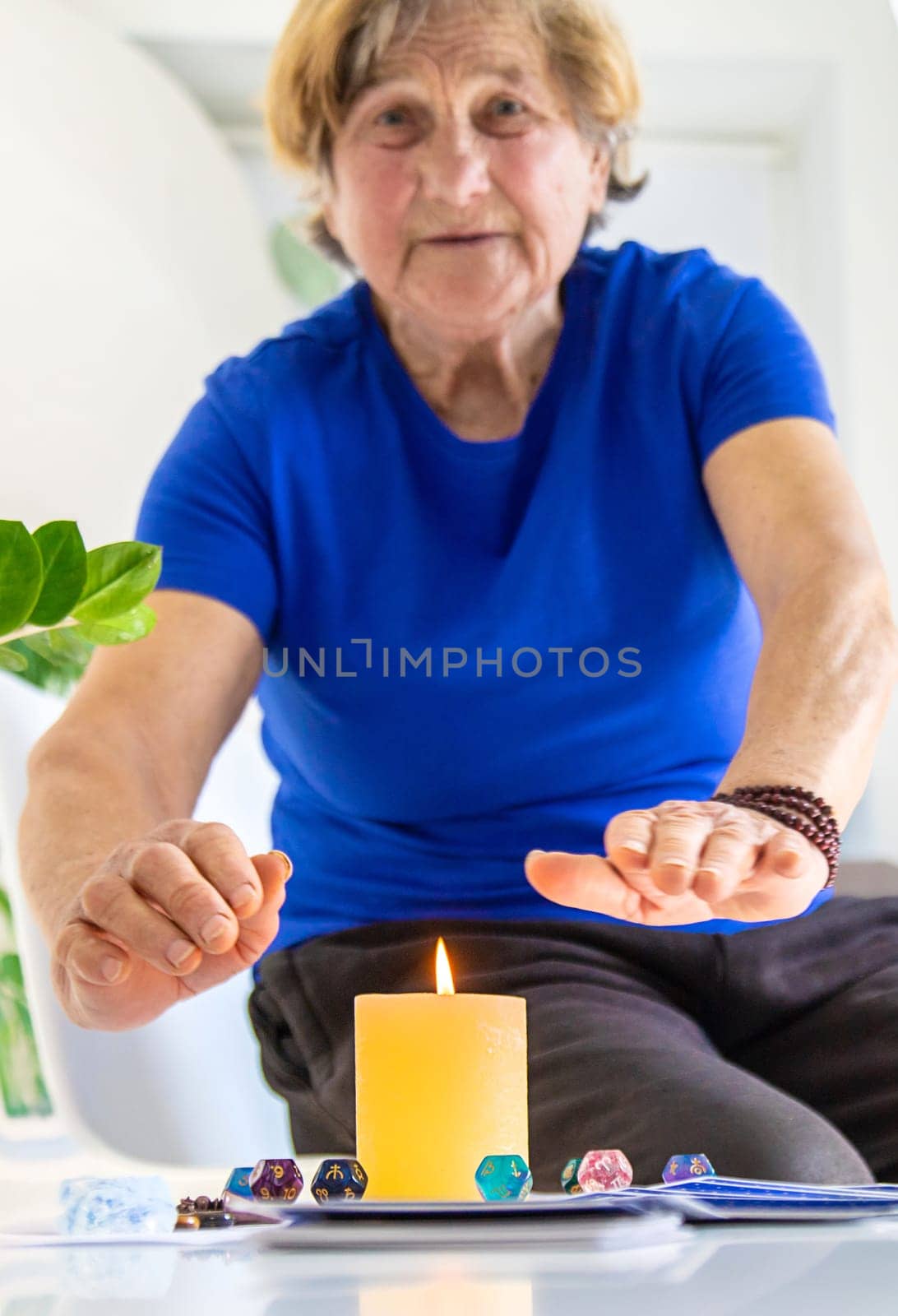 Astrology and fortune telling old fortune teller. Selective focus. people.